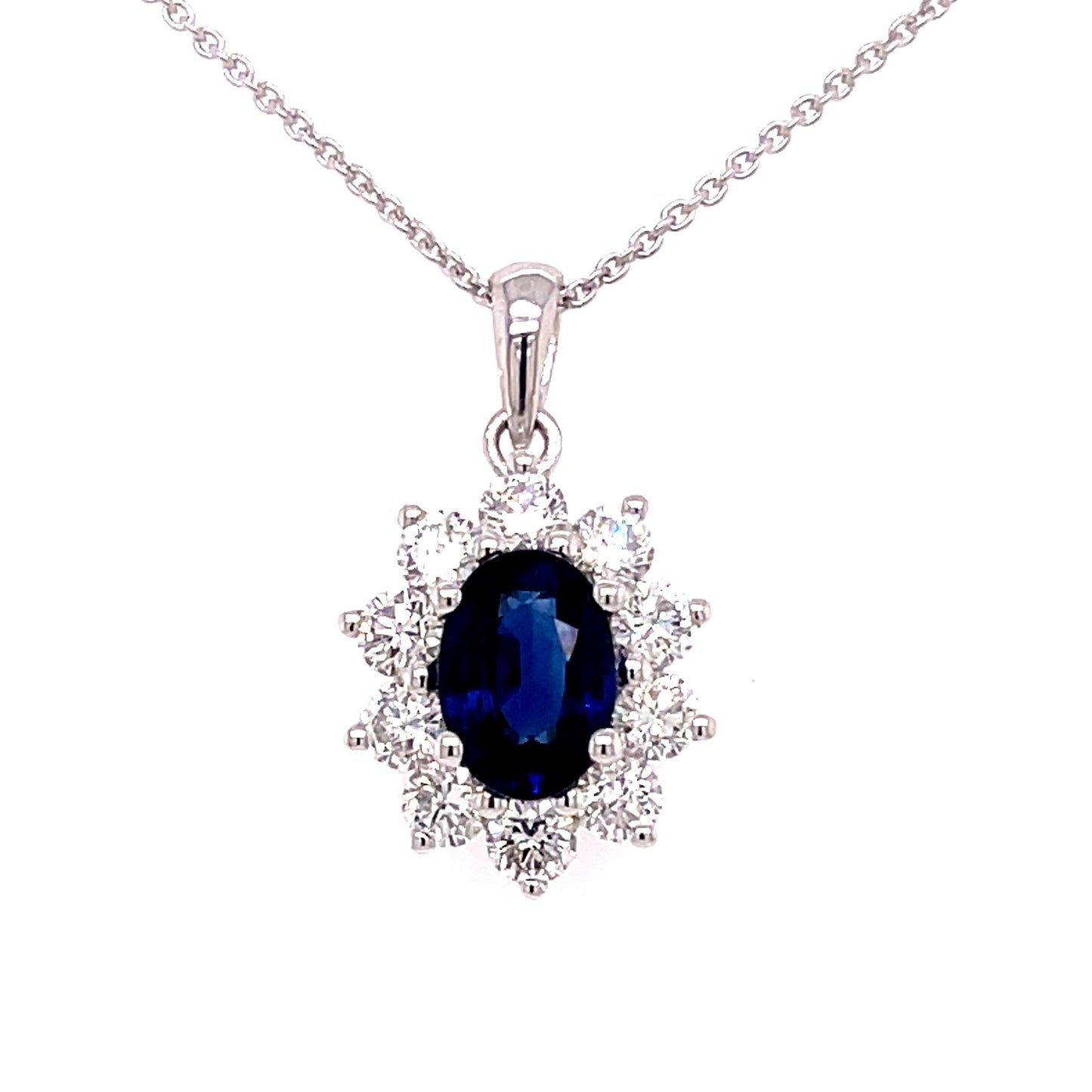 Sapphire and Round Brilliant Cut Diamond Cluster Style Pendant Gardiner Brothers