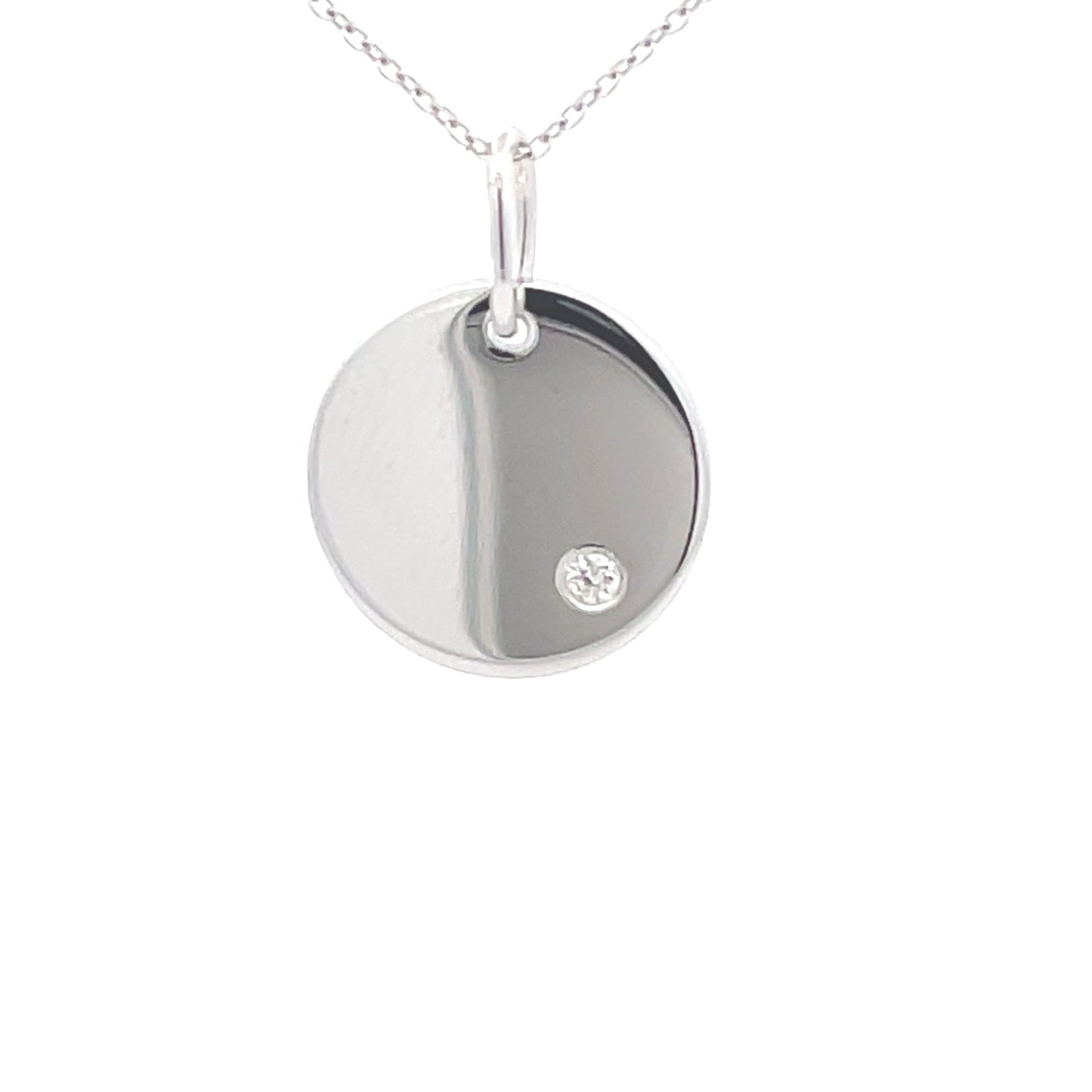 White Gold Round Disc Set With a Round Brilliant Cut Diamond Gardiner Brothers