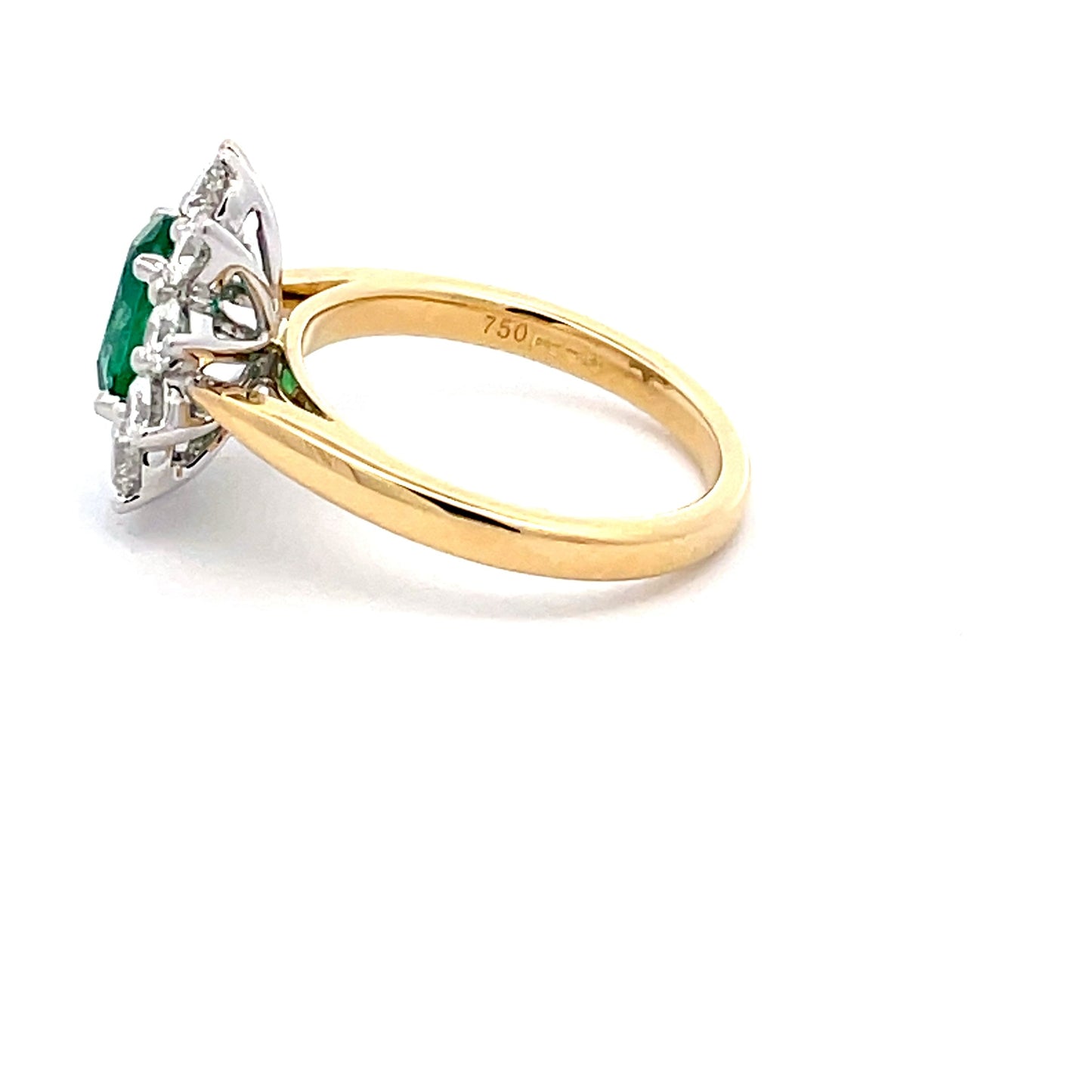 Oval Emerald AND ROUND BRILLIANT CUT DIAMOND CLUSTER STYLE RING Gardiner Brothers