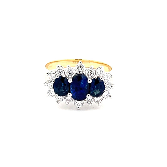 Oval Shaped Sapphire and Diamond Cluster Style Ring  Gardiner Brothers