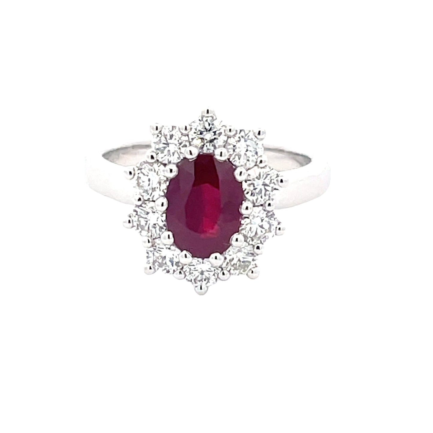 Oval Shaped Ruby and Round Brilliant Cut Diamond Cluster Style Ring Gardiner Brothers