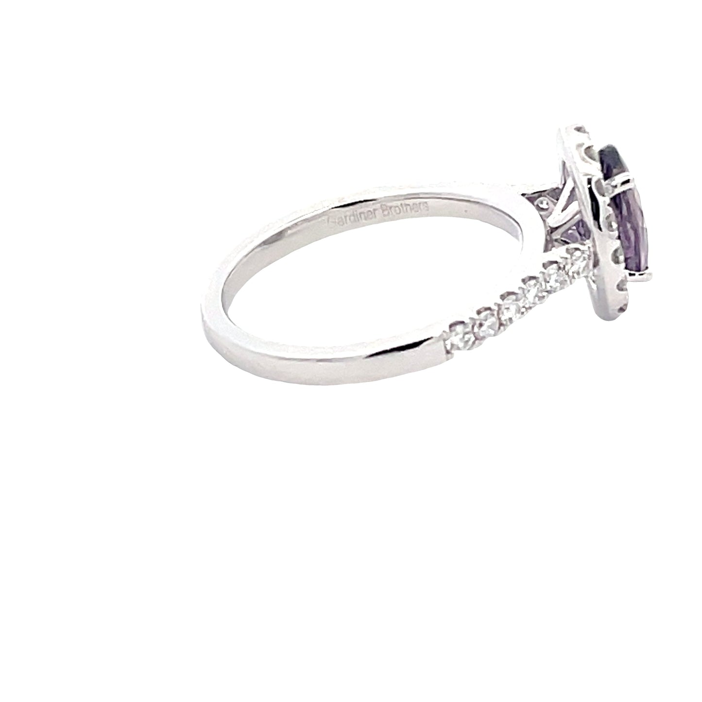 Purple sapphire and Diamond Halo Cluster Style Ring Gardiner Brothers
