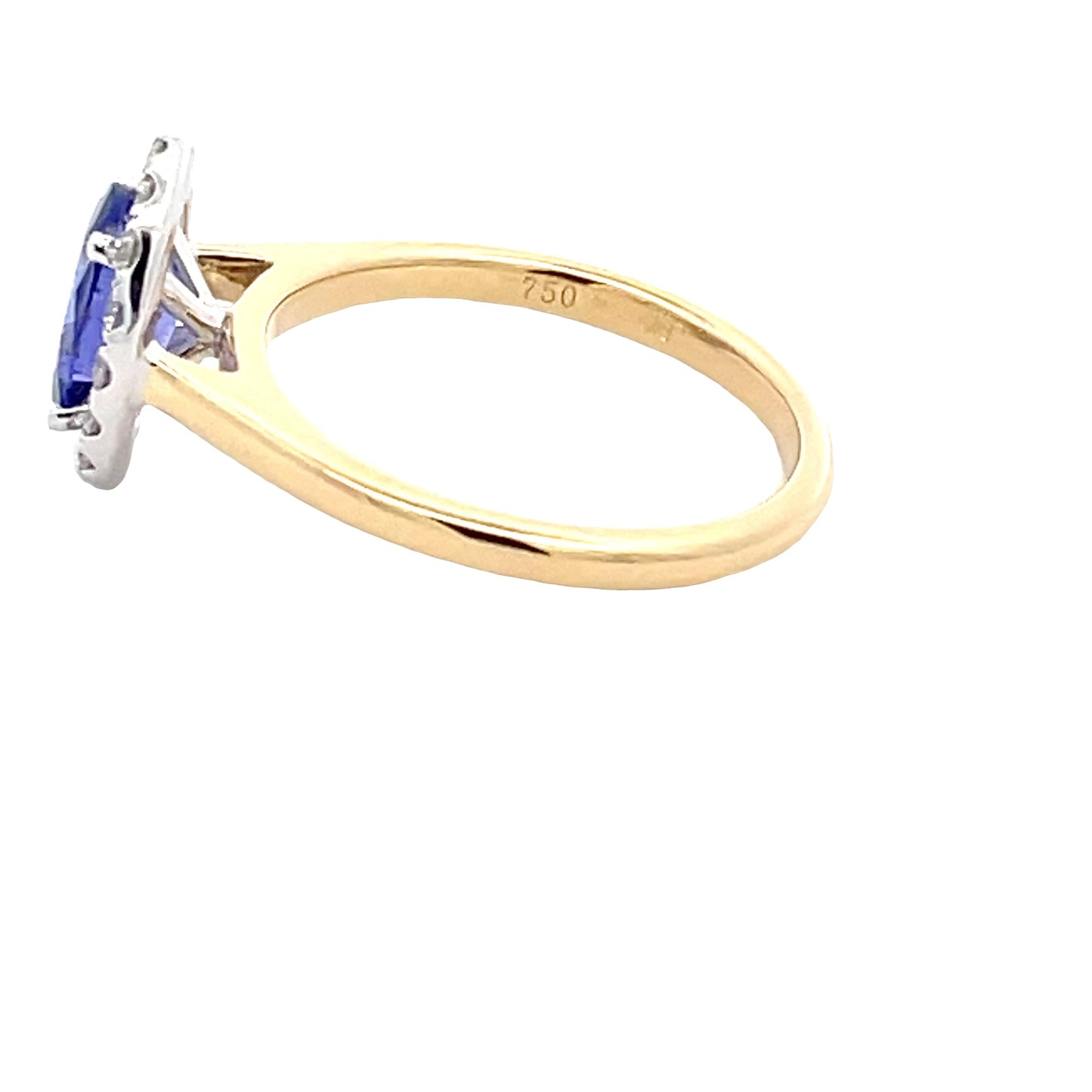 Oval Tanzanite and round brilliant cut diamond halo ring Gardiner Brothers