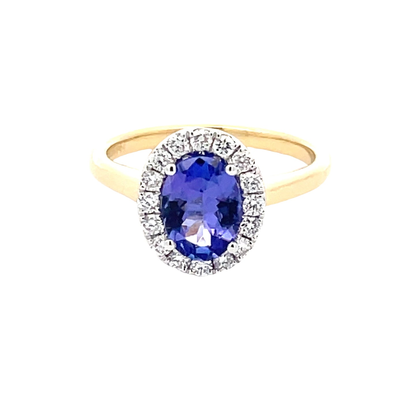 Oval Tanzanite and round brilliant cut diamond halo ring Gardiner Brothers