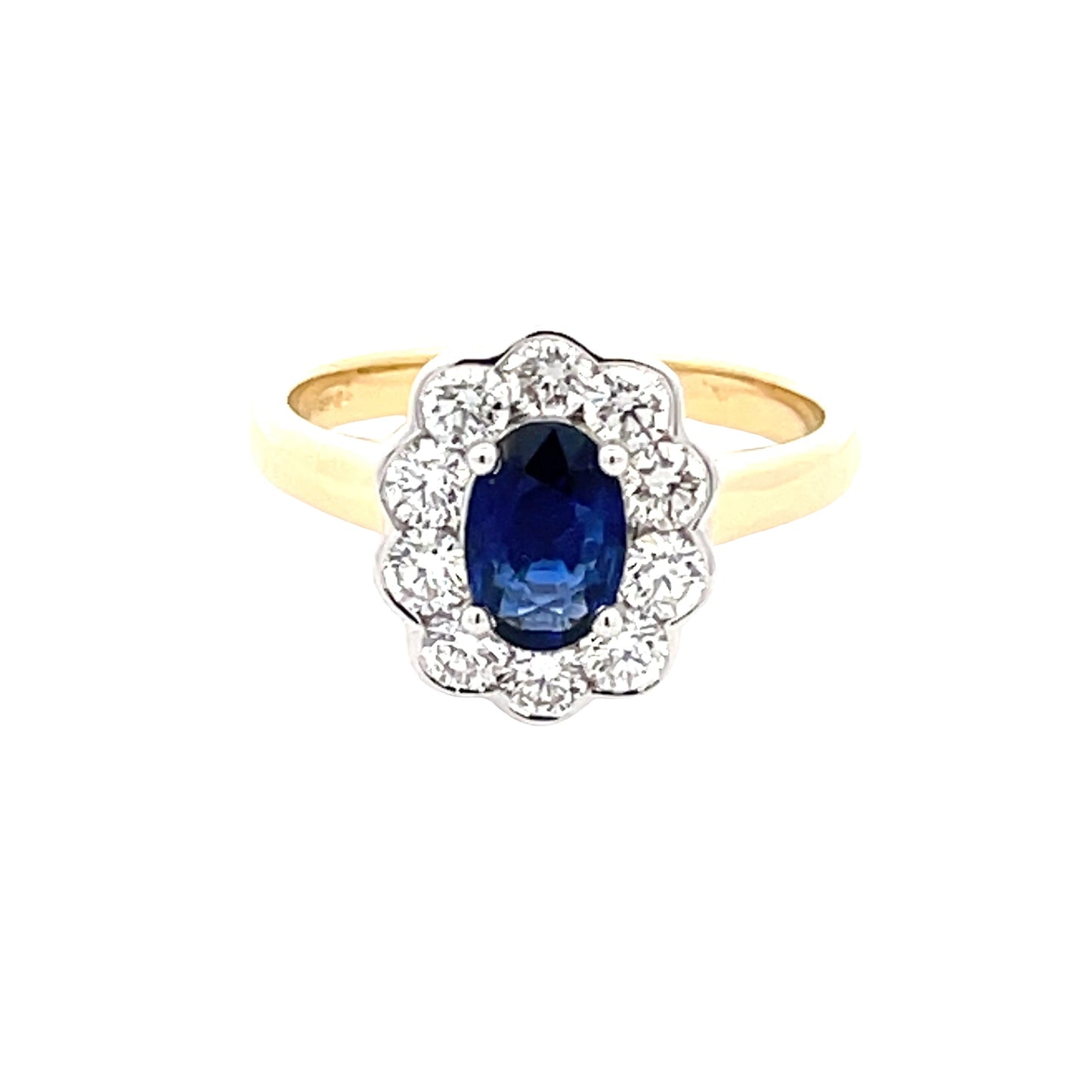 Oval Shaped Sapphire and Round Brilliant Cut Diamond Cluster Style Ring Gardiner Brothers
