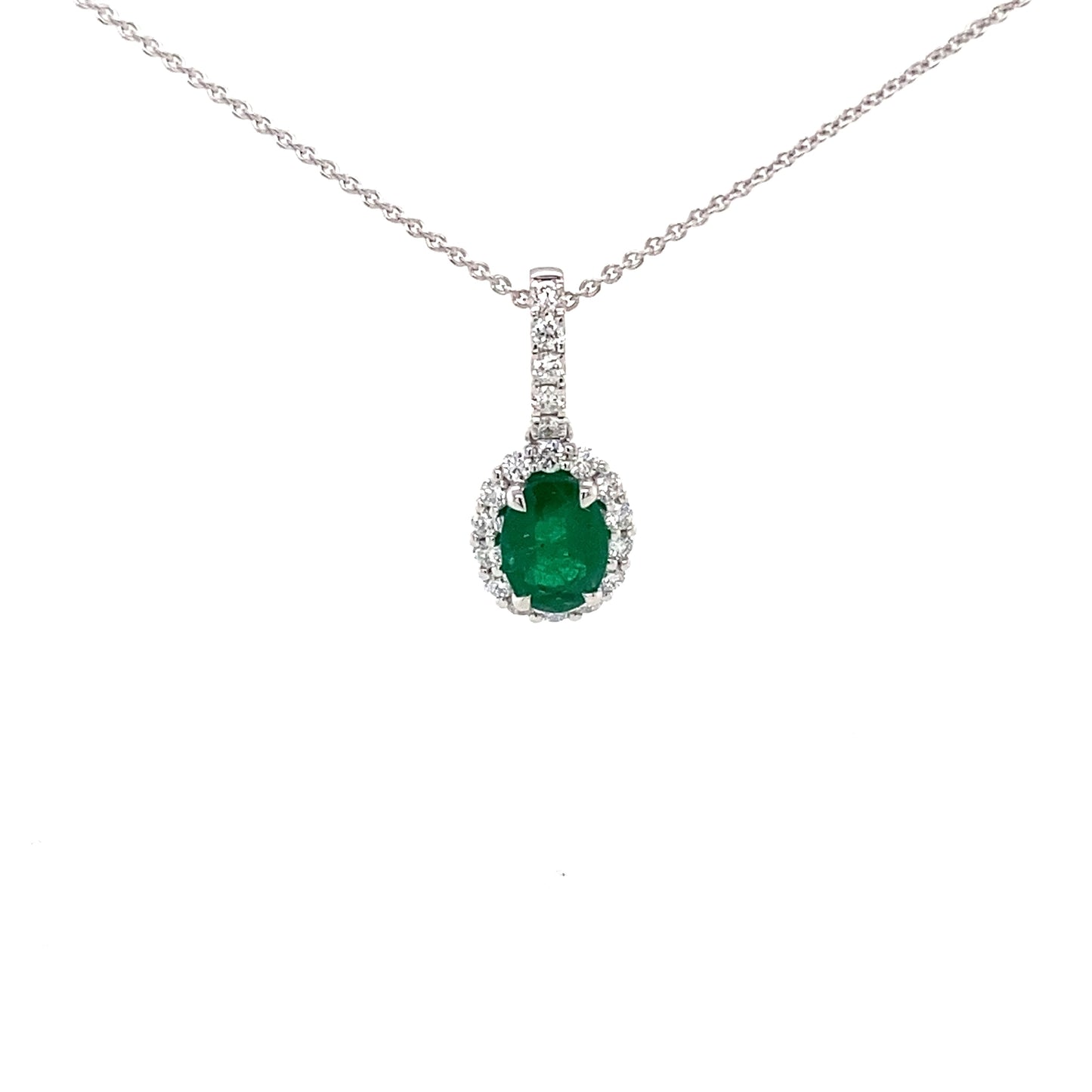 Oval emerald and round brilliant cut diamond halo style pendant Gardiner Brothers