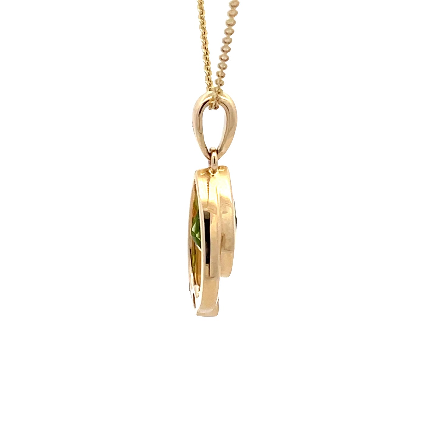 Pear Shaped Peridot and round brilliant cut diamond pendant Gardiner Brothers