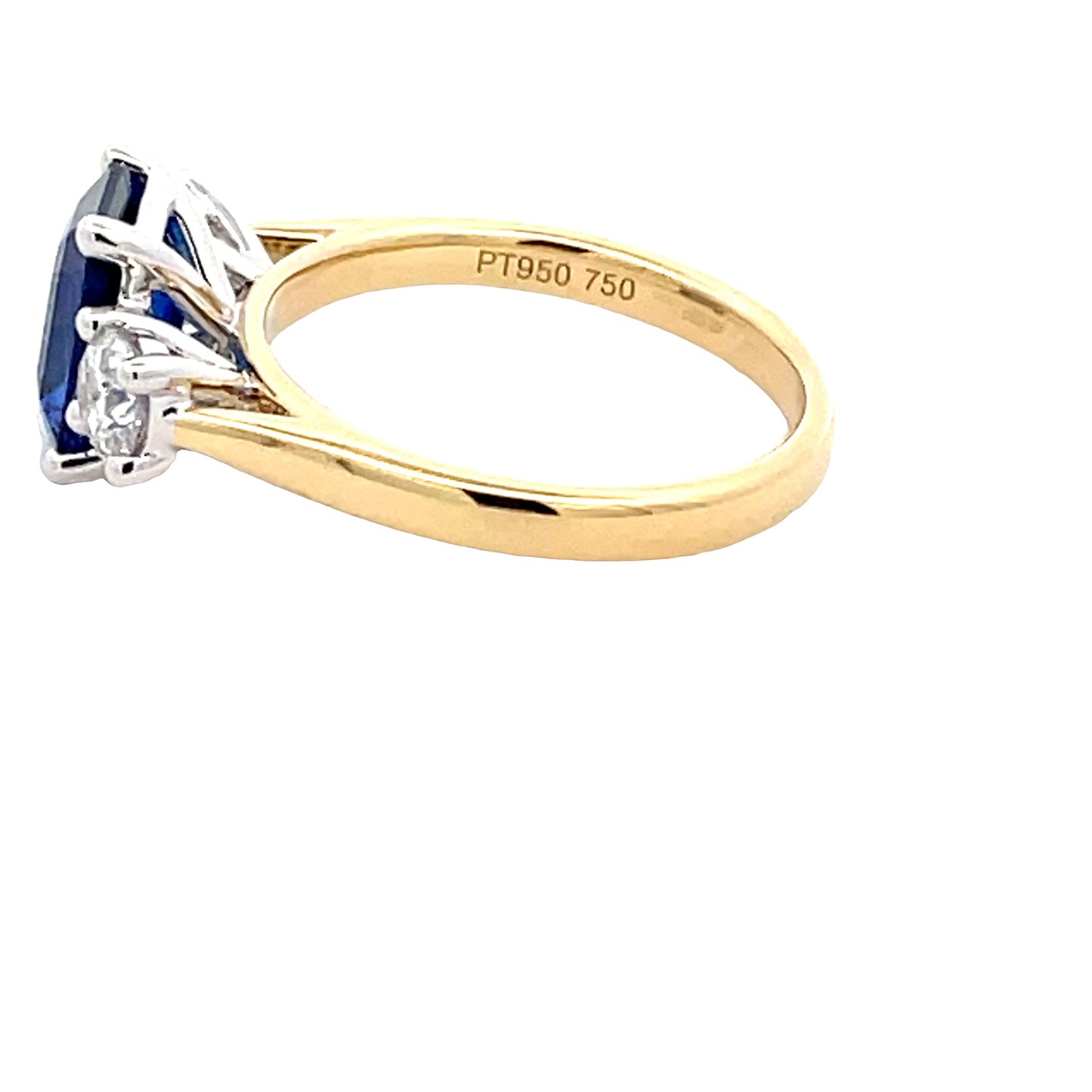 Octagonal Shaped Sapphire and round brilliant cut diamond 3 stone ring Gardiner Brothers
