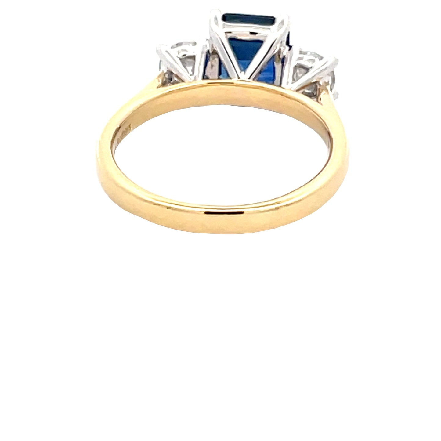 Octagonal Shaped Sapphire and round brilliant cut diamond 3 stone ring Gardiner Brothers