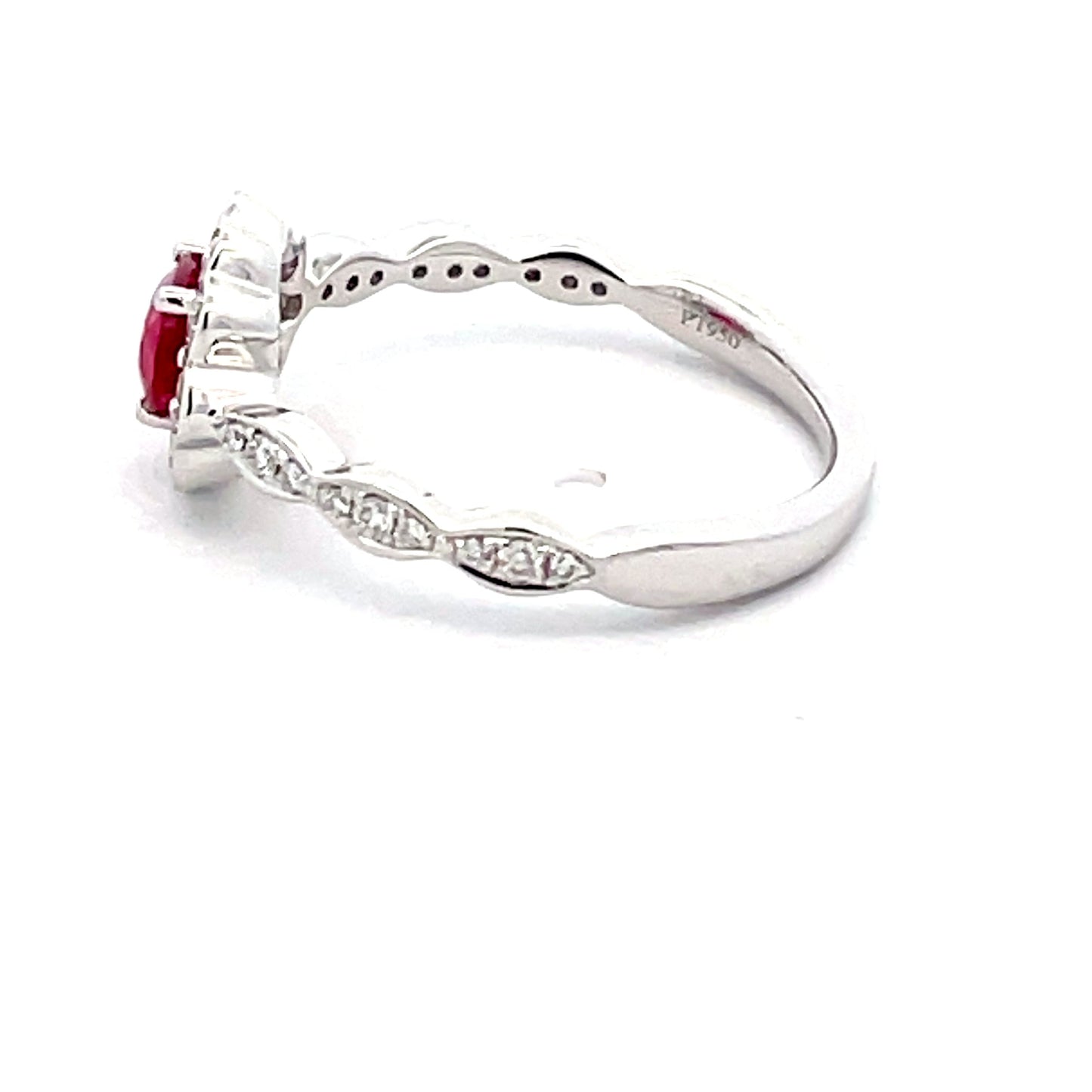 Oval Shaped Ruby and around brilliant cut diamond vintage style cluster Gardiner Brothers