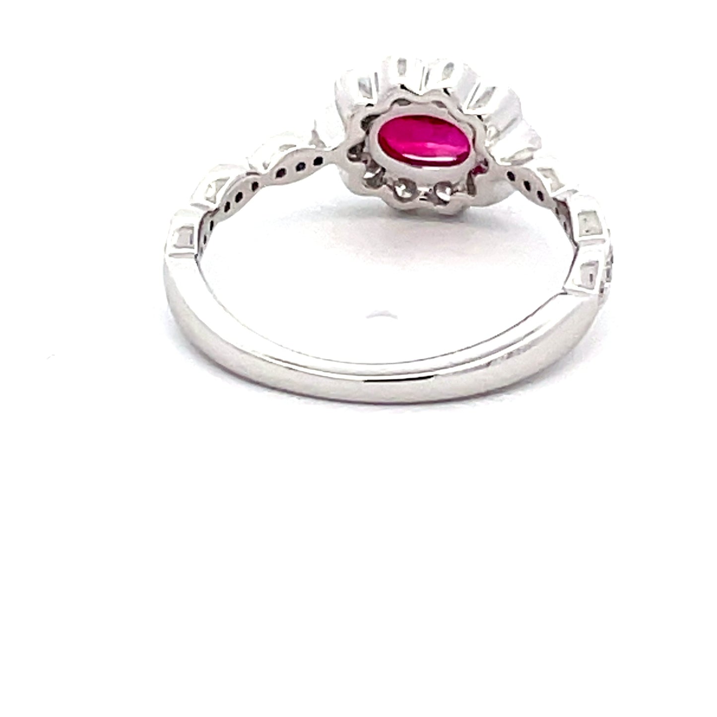 Oval Shaped Ruby and around brilliant cut diamond vintage style cluster Gardiner Brothers