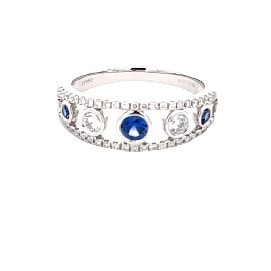 Round Sapphire and round brilliant cut diamond fancy style dress ring  Gardiner Brothers