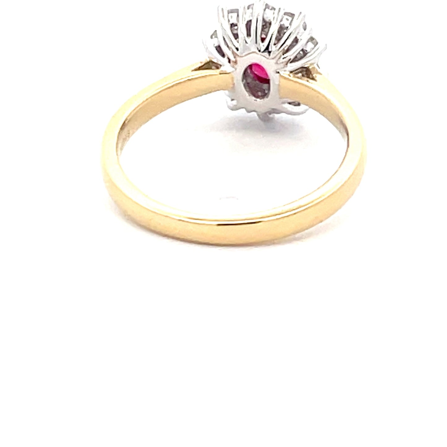 Oval Shaped Ruby and round brilliant cut diamond cluster style ring Gardiner Brothers