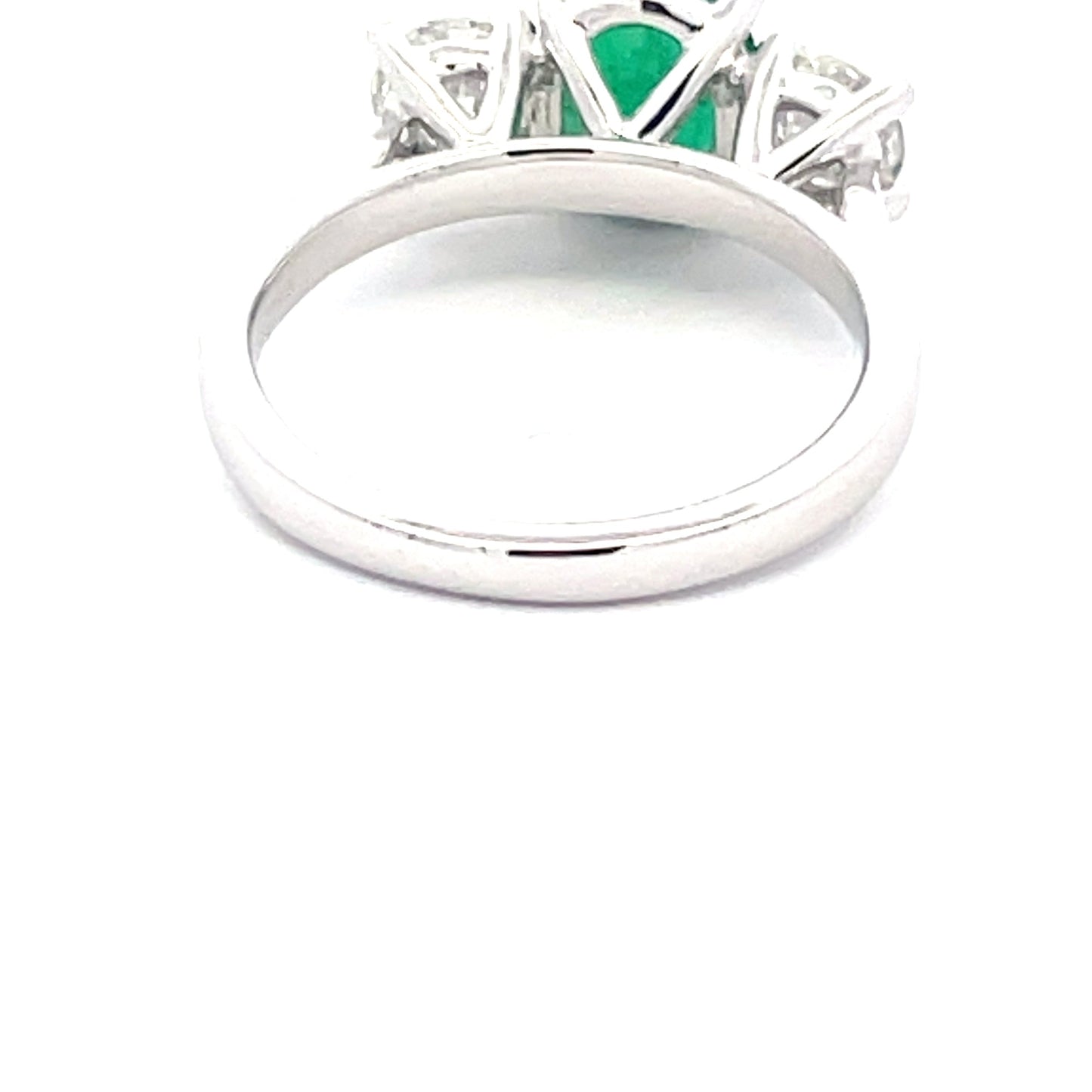 Oval Emerald and round brilliant cut diamond 3 stone ring Gardiner Brothers