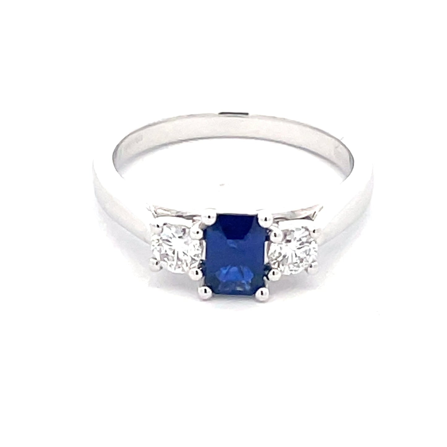 Octagonal Sapphire and round brilliant cut diamond 3 stone ring Gardiner Brothers