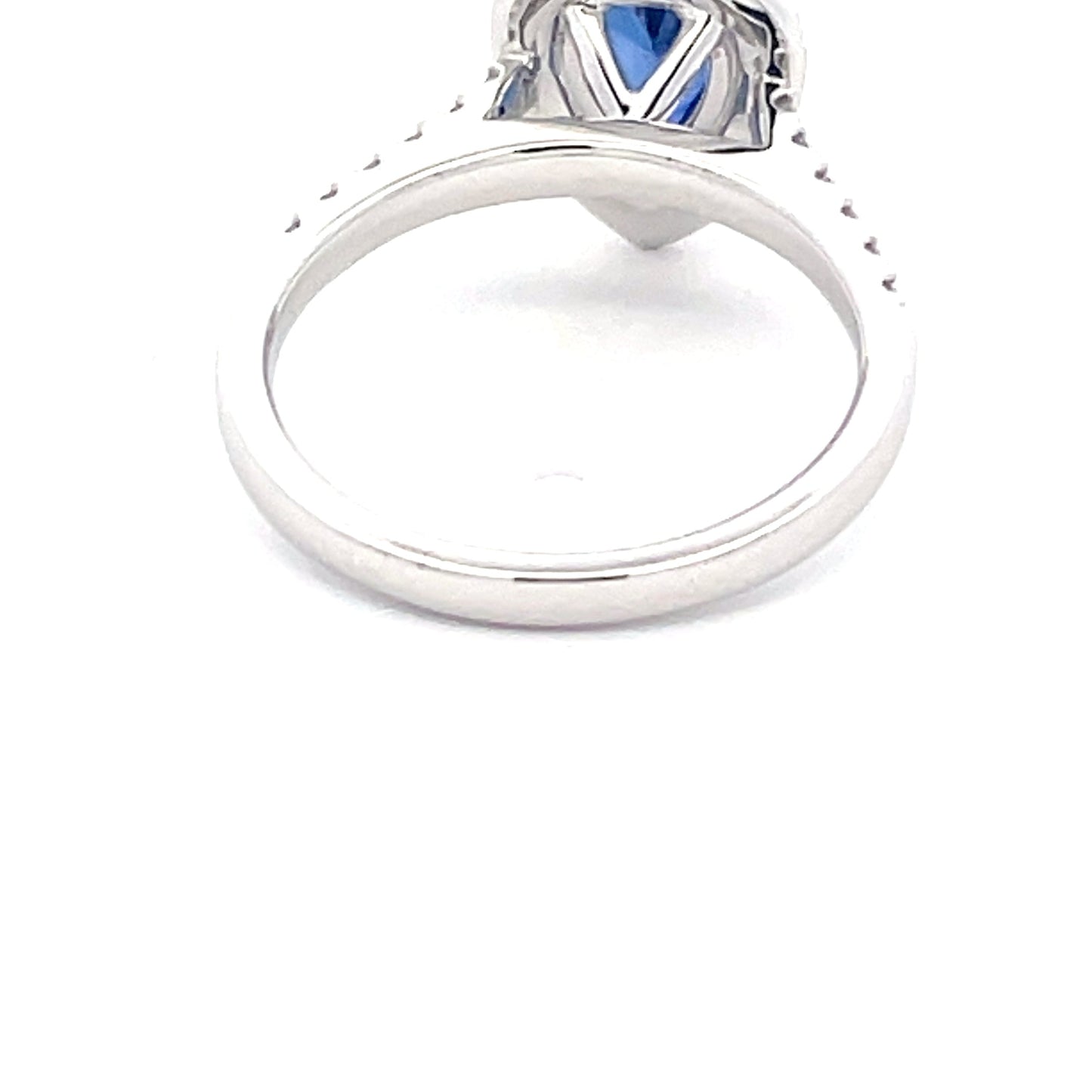 Pear Shaped Sapphire and round brilliant cut diamond halo cluster style ring Gardiner Brothers