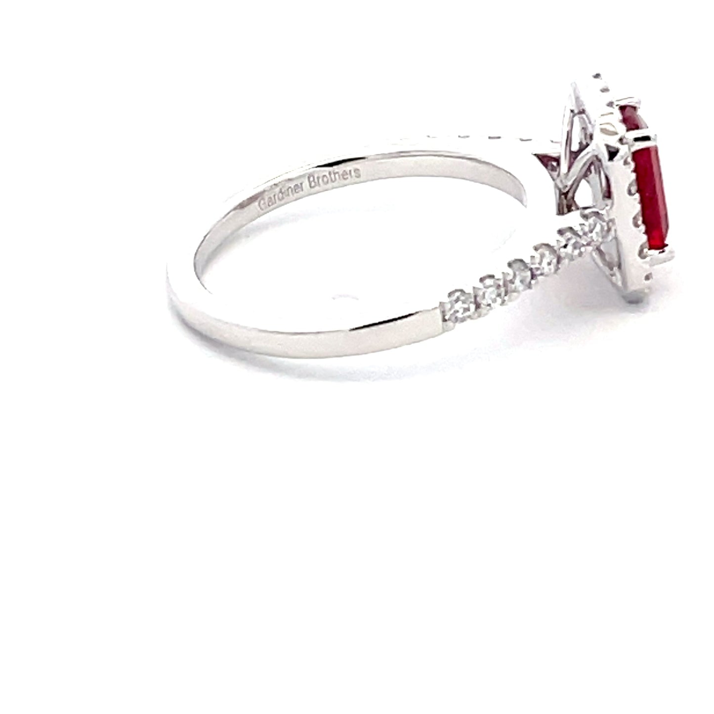 Octagonal Shaped Ruby and Round Brilliant Cut Diamond Halo Cluster Style Ring Gardiner Brothers