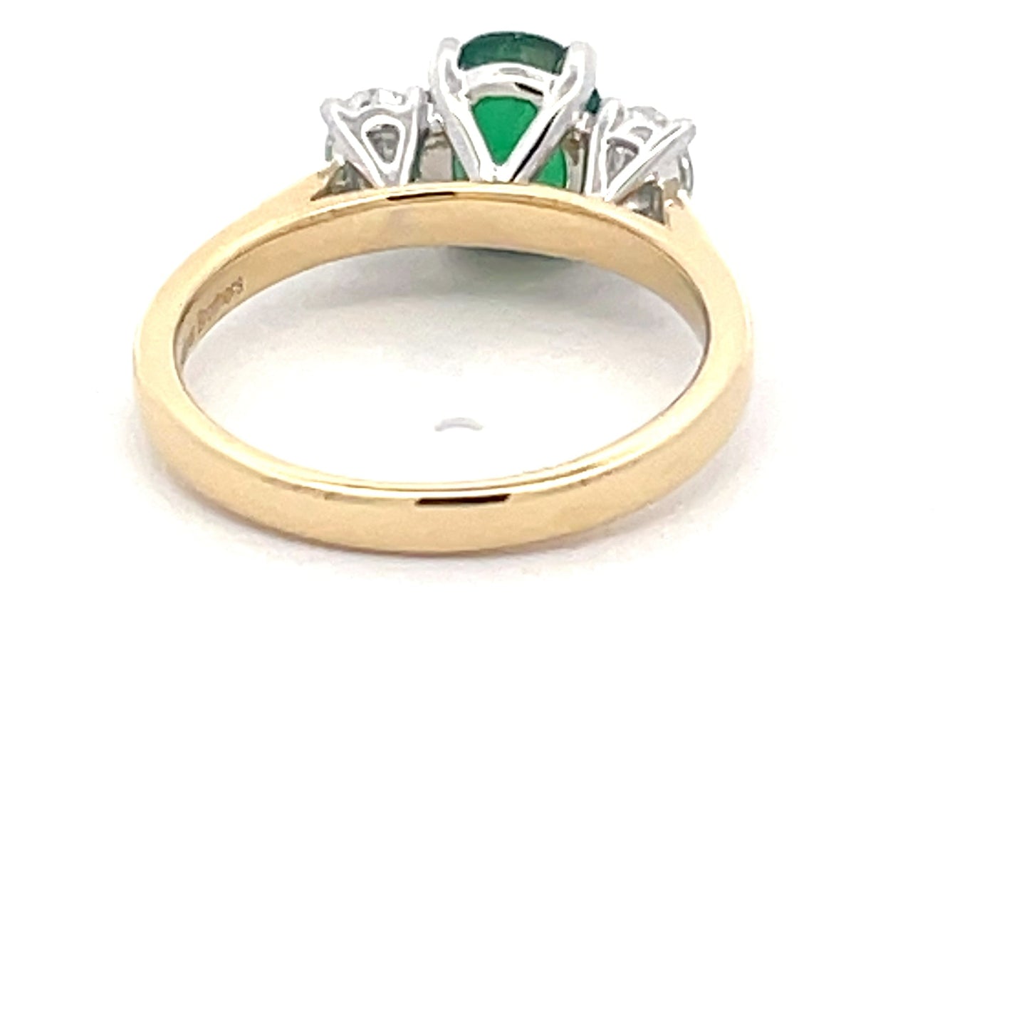 Oval Shaped Emerald and Oval Diamond 3 stone ring Gardiner Brothers