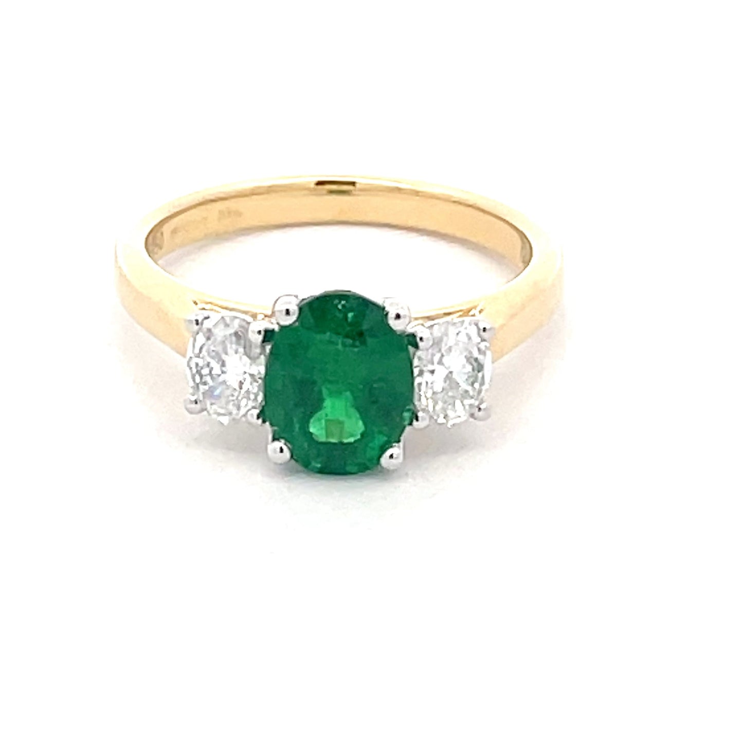 Oval Shaped Emerald and Oval Diamond 3 stone ring Gardiner Brothers