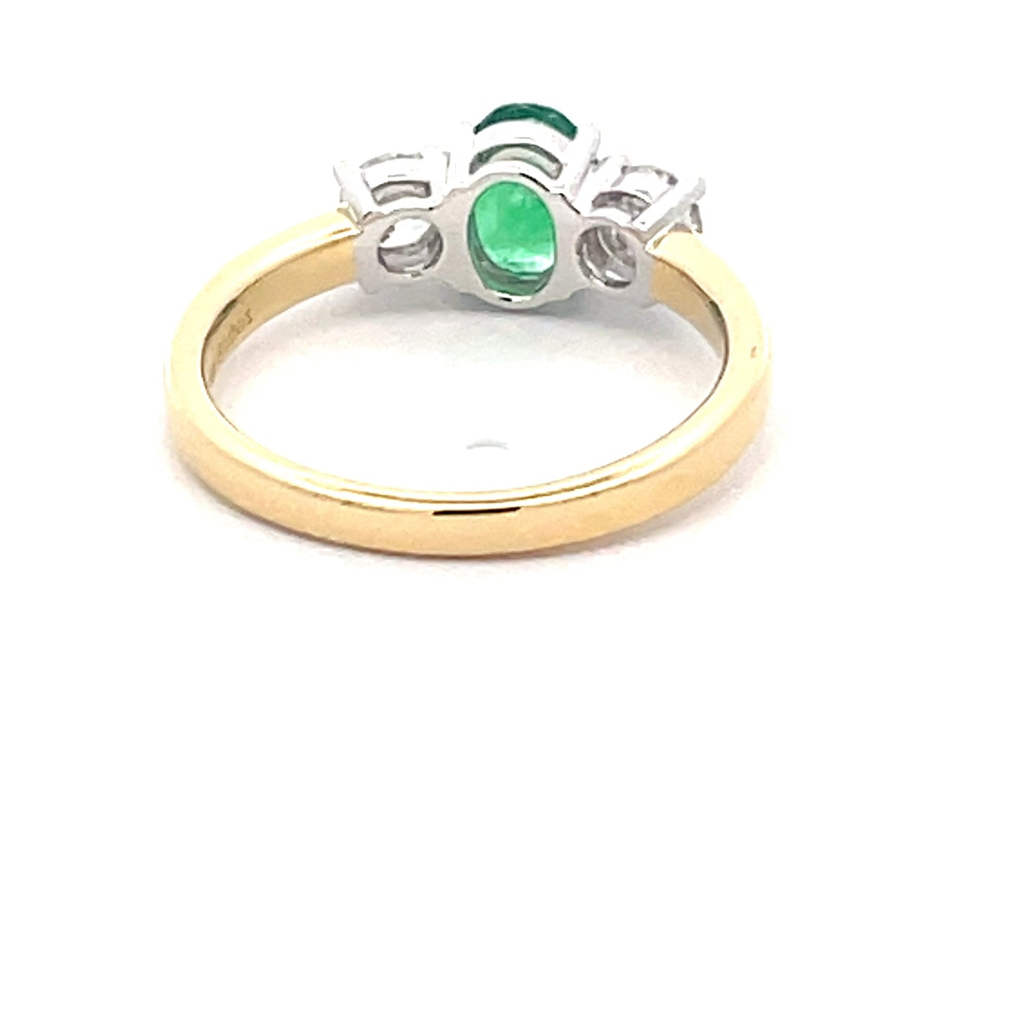 Oval Emerald and round brilliant cut diamond 3 stone ring Gardiner Brothers