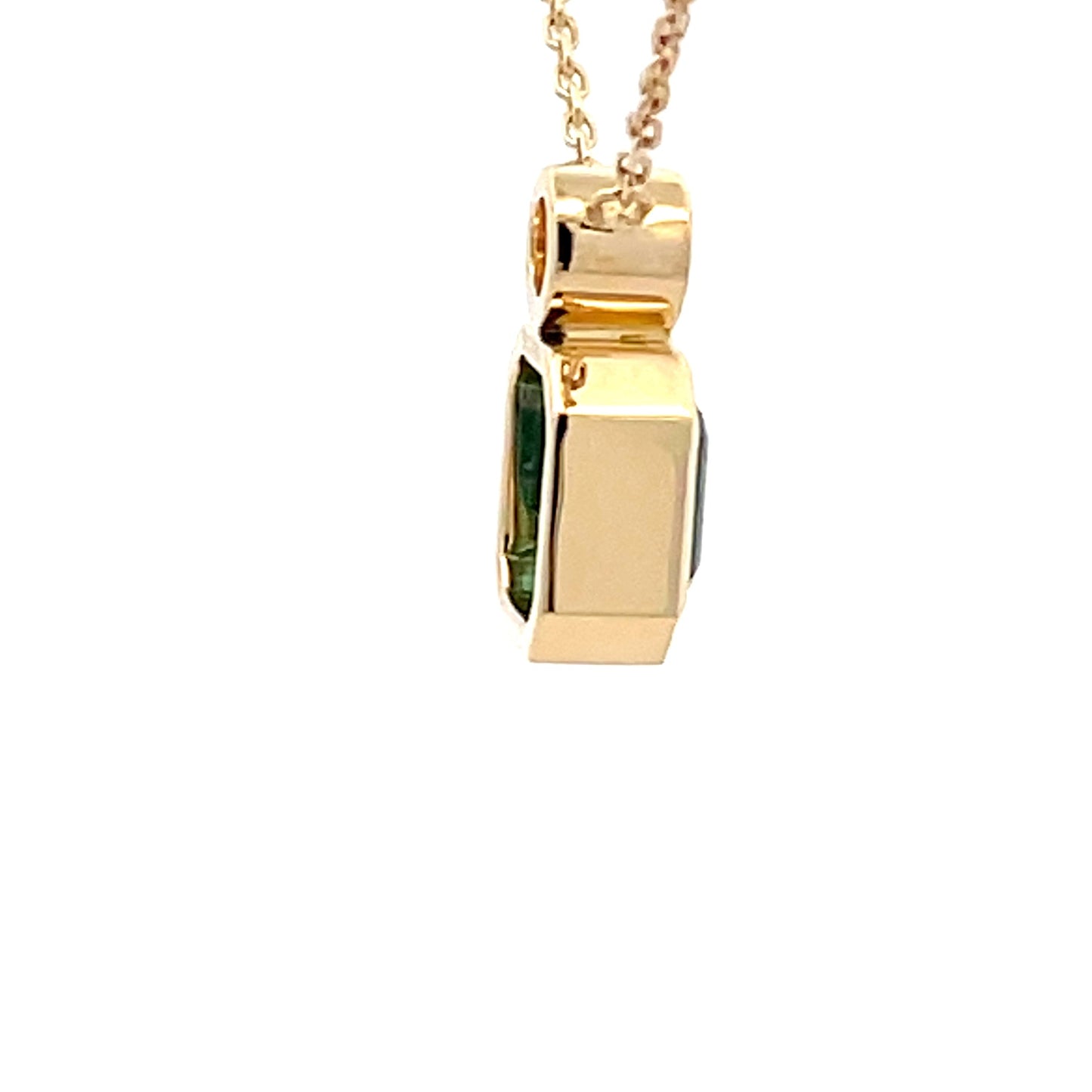Square Step-cut Emerald and round brilliant cut diamond pendant Gardiner Brothers