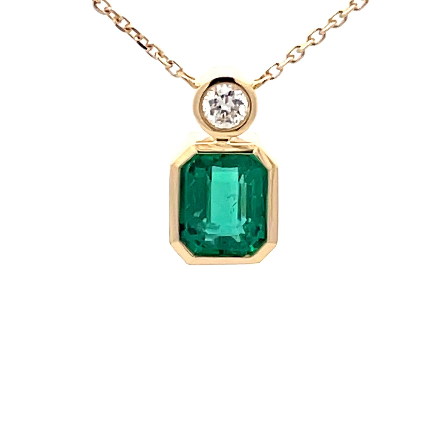 Square Step-cut Emerald and round brilliant cut diamond pendant Gardiner Brothers
