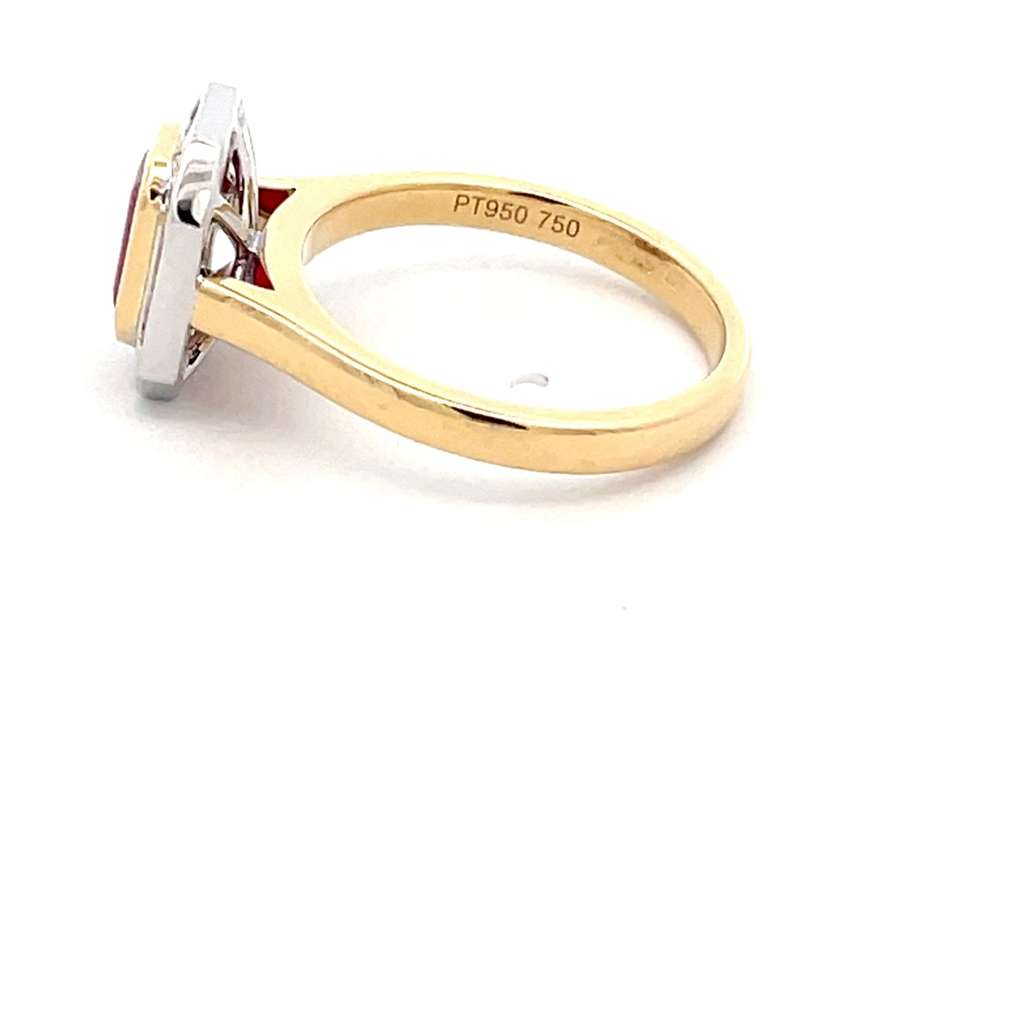 Octagonal Ruby with brilliant cut baguette cut diamond cluster ring Gardiner Brothers