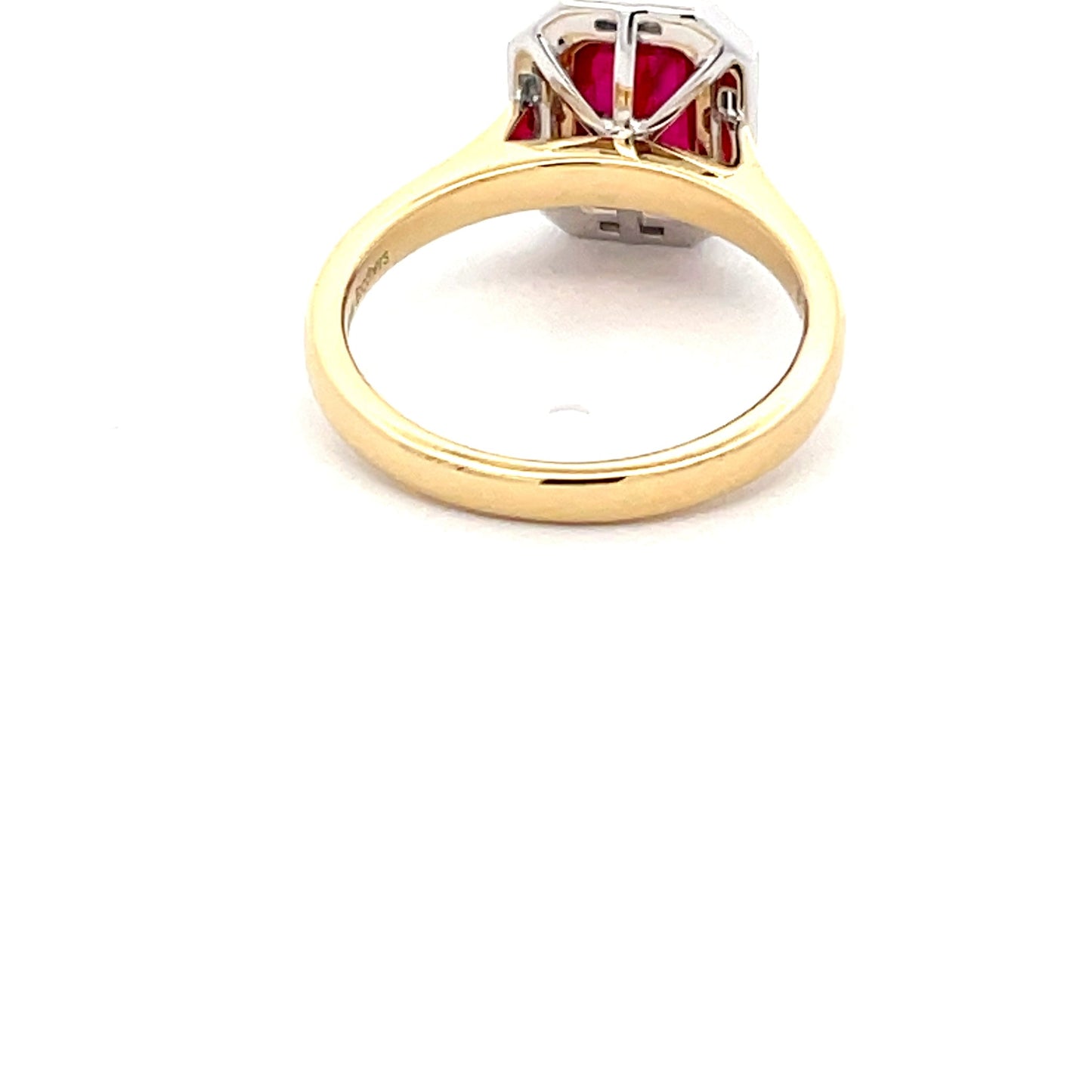Octagonal Ruby with brilliant cut baguette cut diamond cluster ring Gardiner Brothers