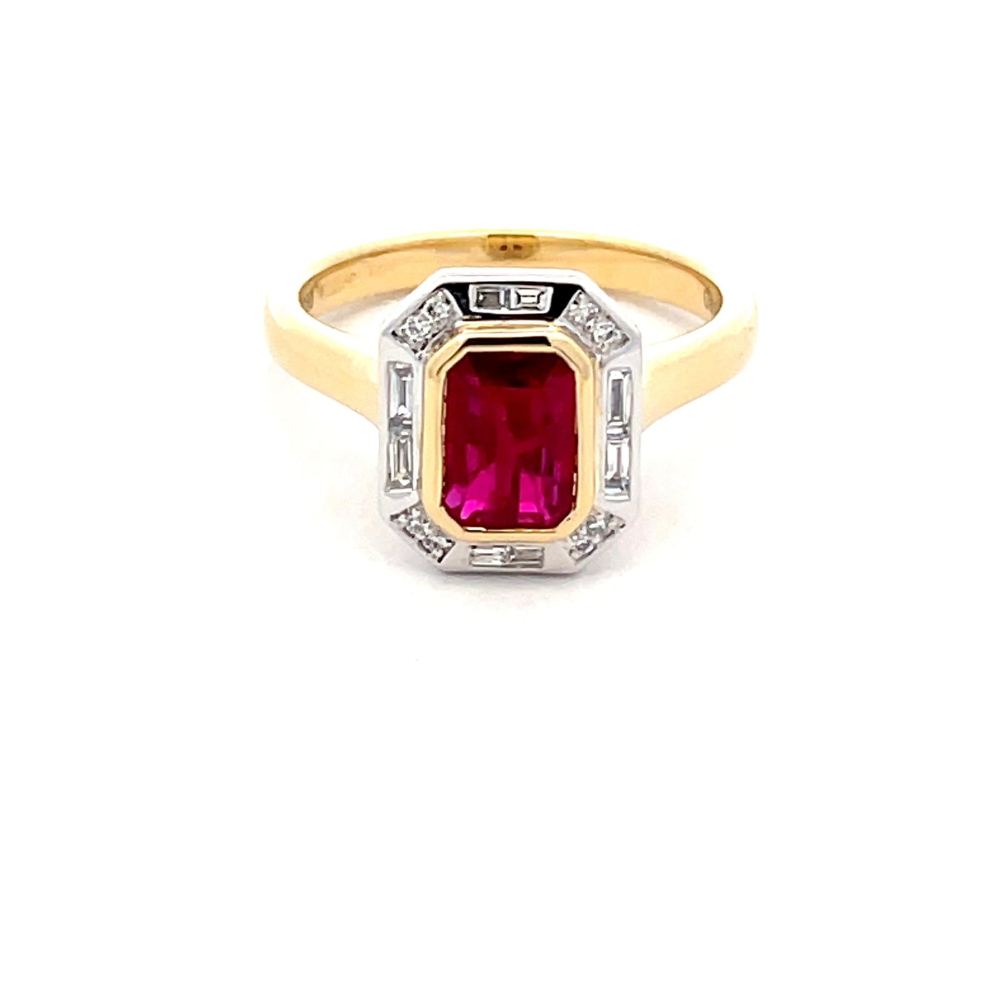 Octagonal Ruby with brilliant cut baguette cut diamond cluster ring Gardiner Brothers