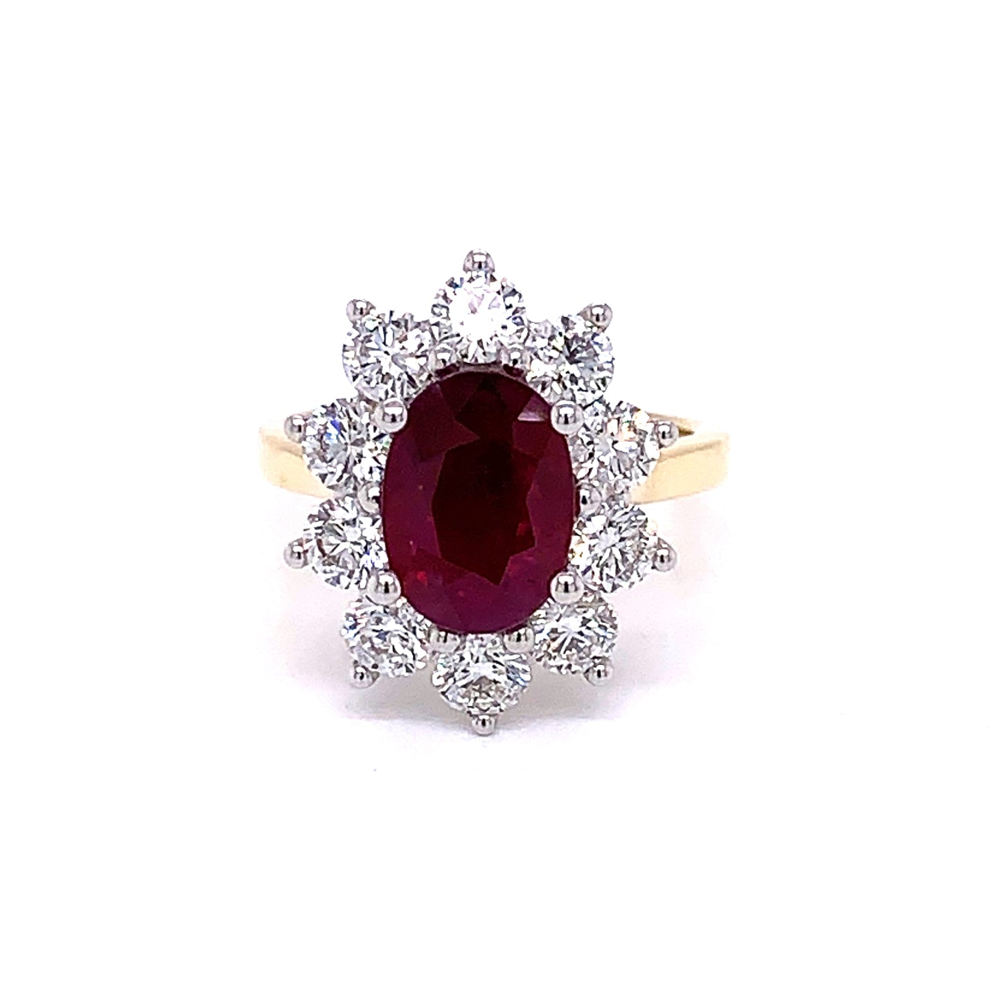 Oval Ruby and Round Brilliant Cut Diamond Cluster Ring gardiner-brothers