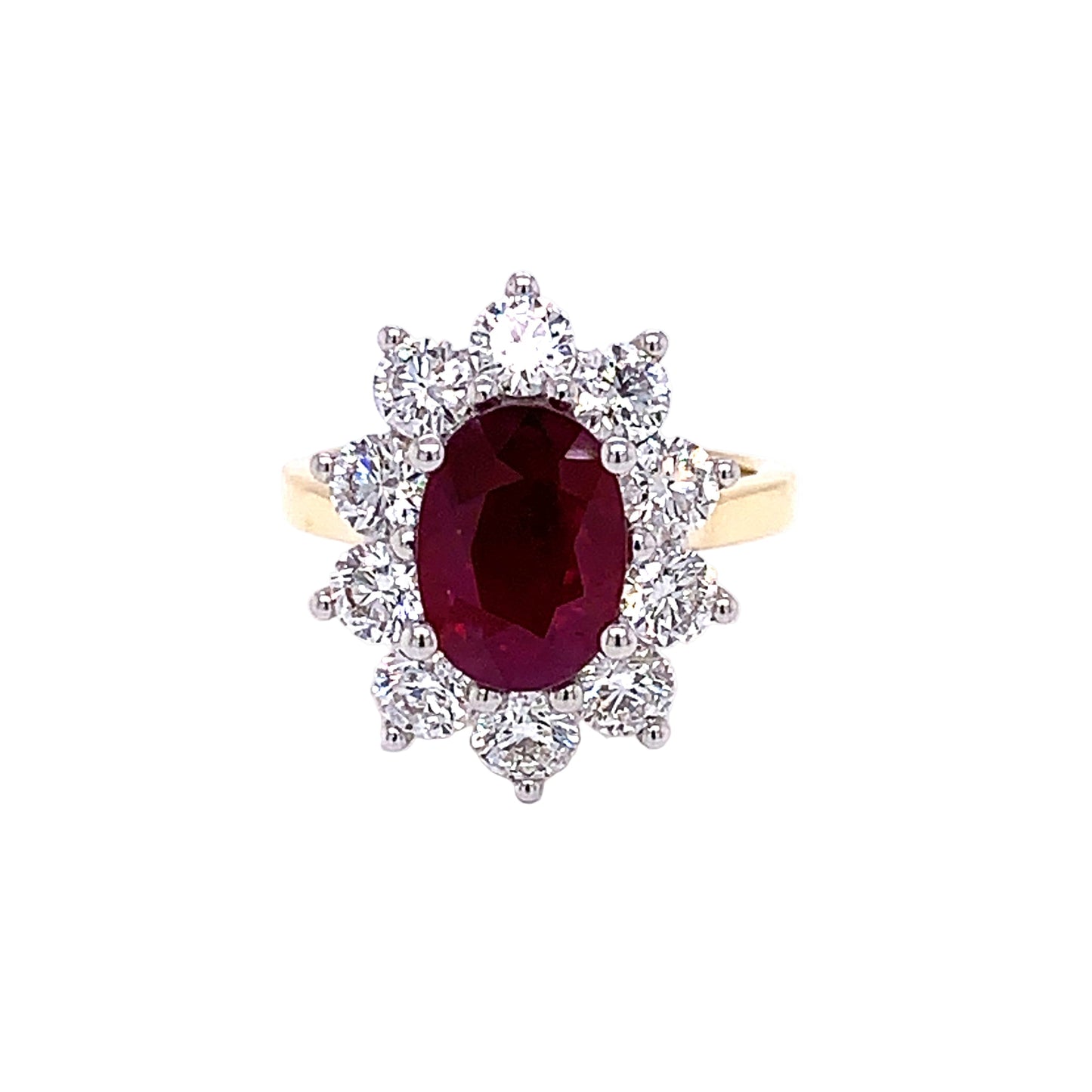 Oval Ruby and Round Brilliant Cut Diamond Cluster Ring gardiner-brothers