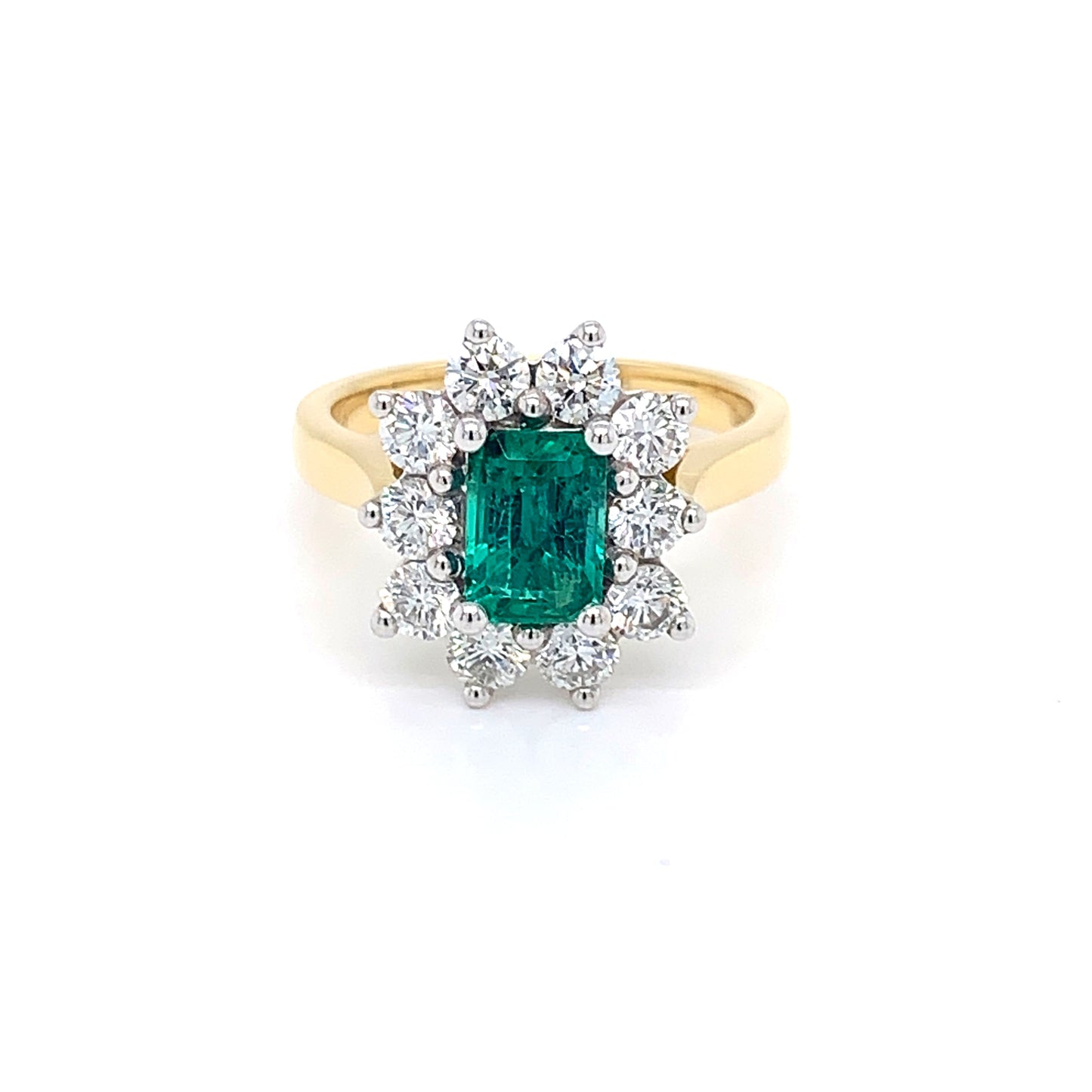 Octagonal Emerald and round brilliant cut Diamond Cluster Ring gardiner-brothers