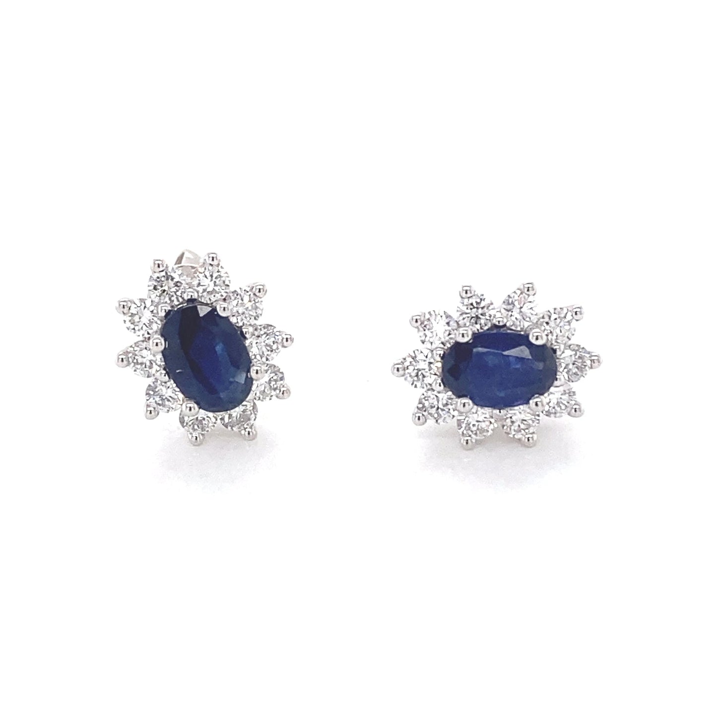 Sapphire and round brilliant cut diamond cluster style earrings Gardiner Brothers