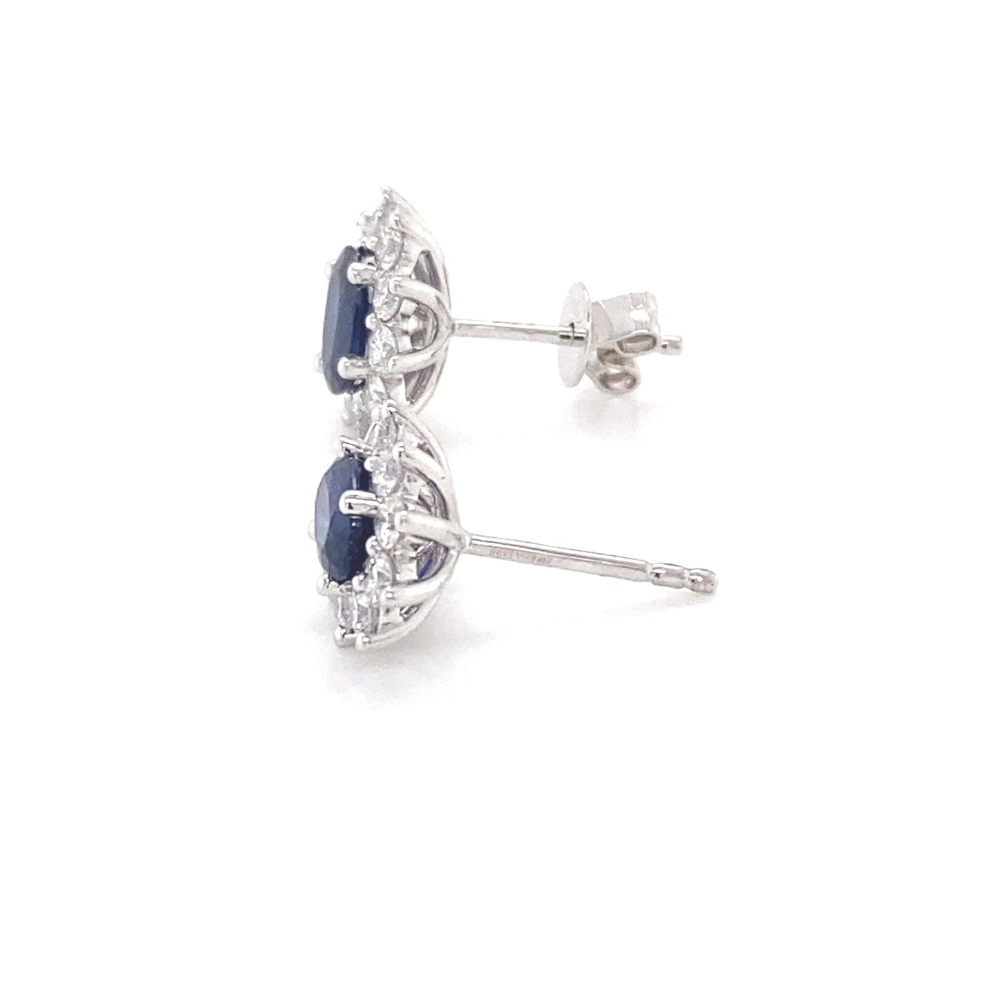 Sapphire and round brilliant cut diamond cluster style earrings Gardiner Brothers