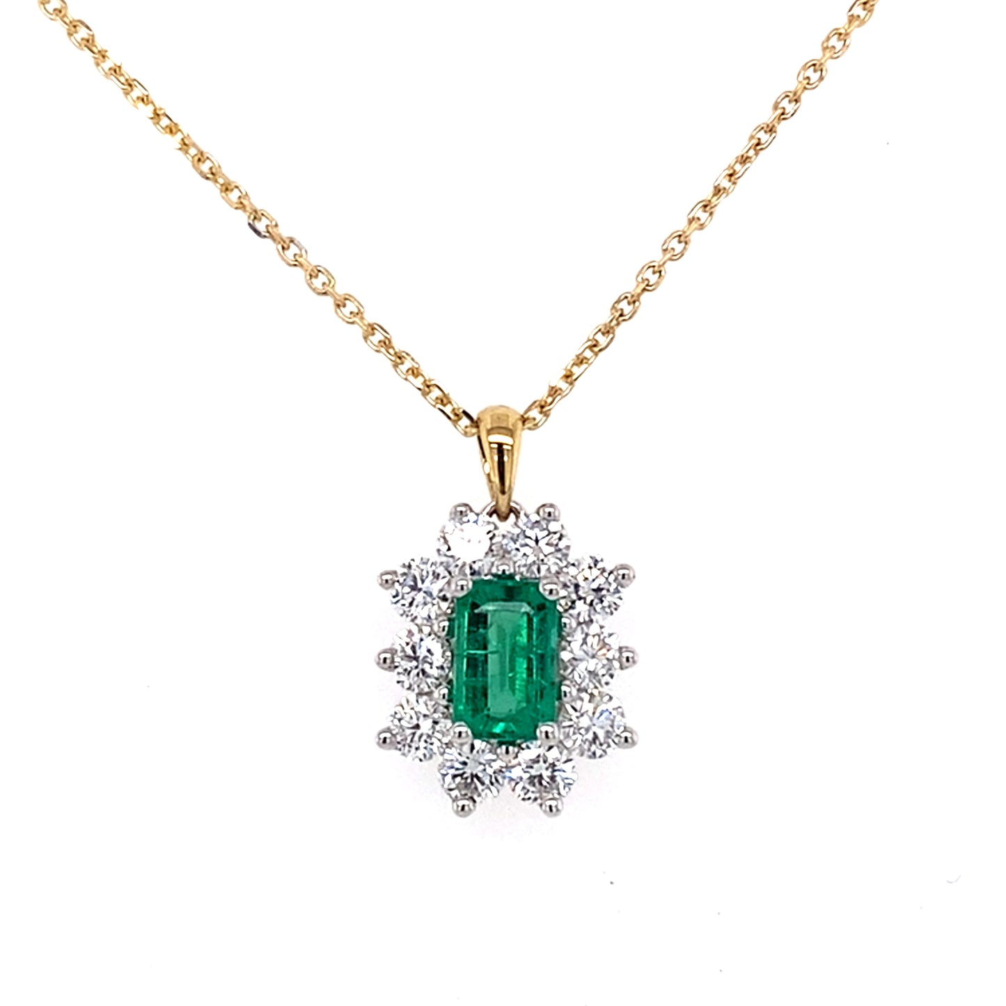 Octagonal emerald and round brilliant cut diamond cluster pendant Gardiner Brothers