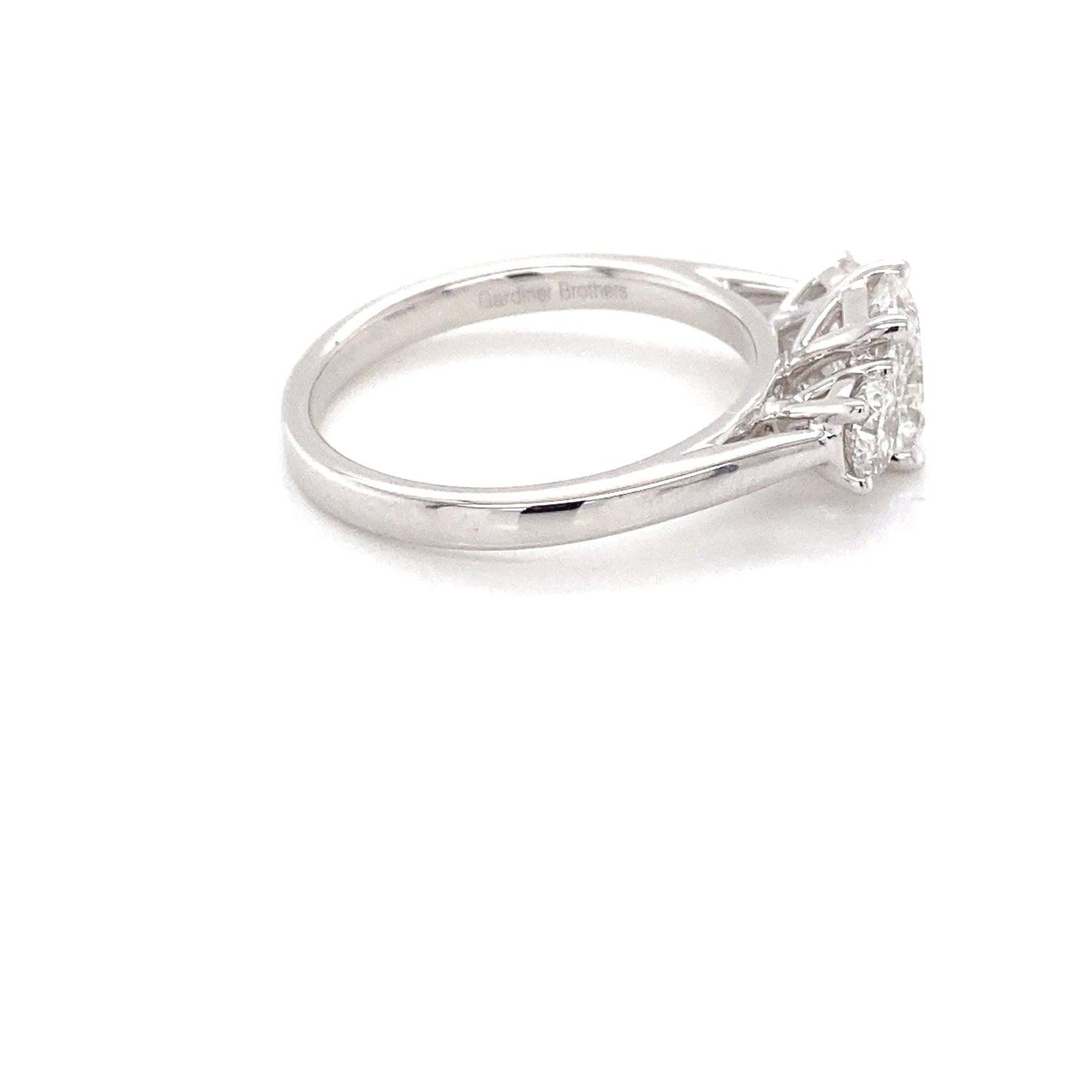 Platinum Cushion and round brilliant cut diamond 3 stone ring - 1.52cts Gardiner Brothers