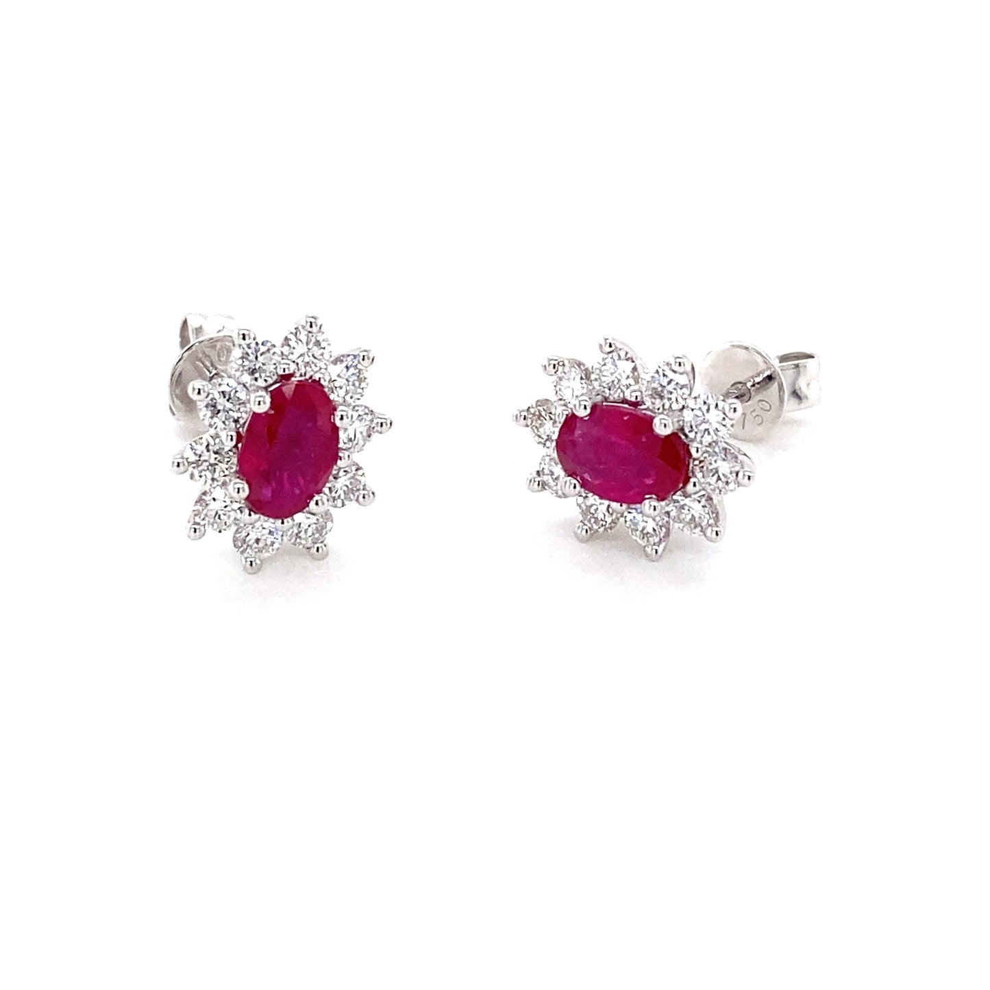 Oval Ruby and round brilliant cut diamond cluster style earrings Gardiner Brothers