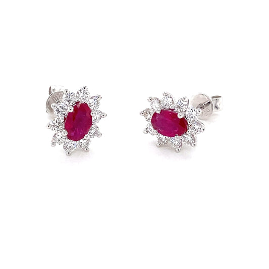 Oval Ruby and round brilliant cut diamond cluster style earrings  Gardiner Brothers