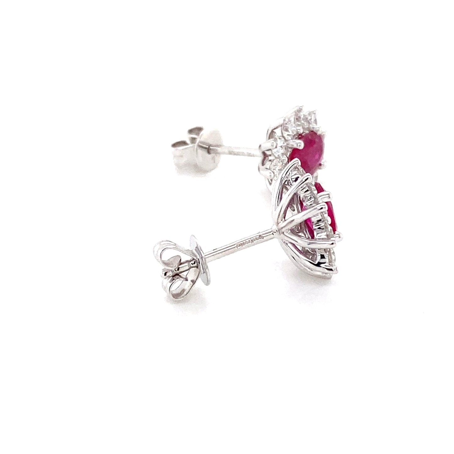 Oval Ruby and round brilliant cut diamond cluster style earrings Gardiner Brothers