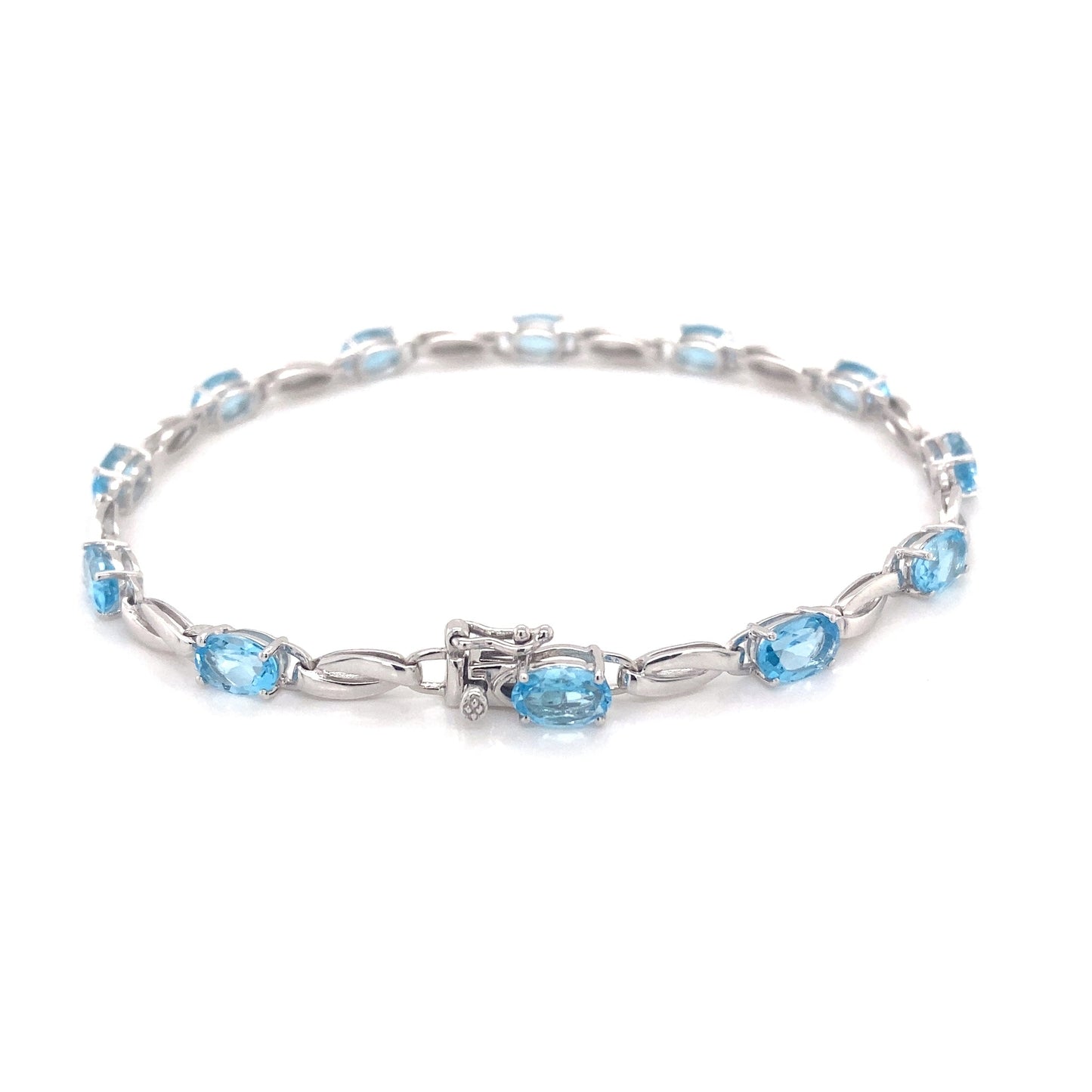 Swiss Blue Topaz and white gold bracelet Gardiner Brothers