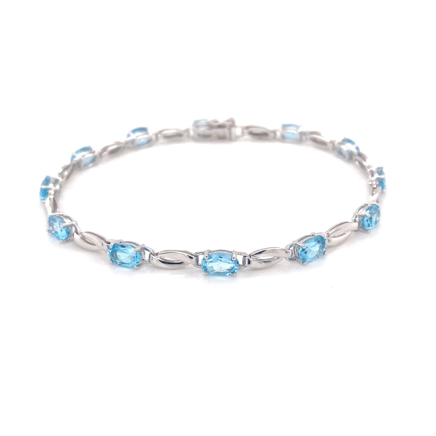 Swiss Blue Topaz and white gold bracelet Gardiner Brothers