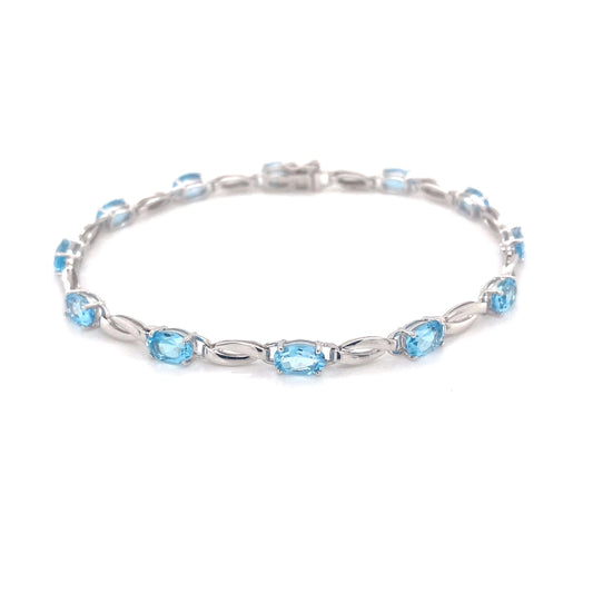 Swiss Blue Topaz and white gold bracelet  Gardiner Brothers