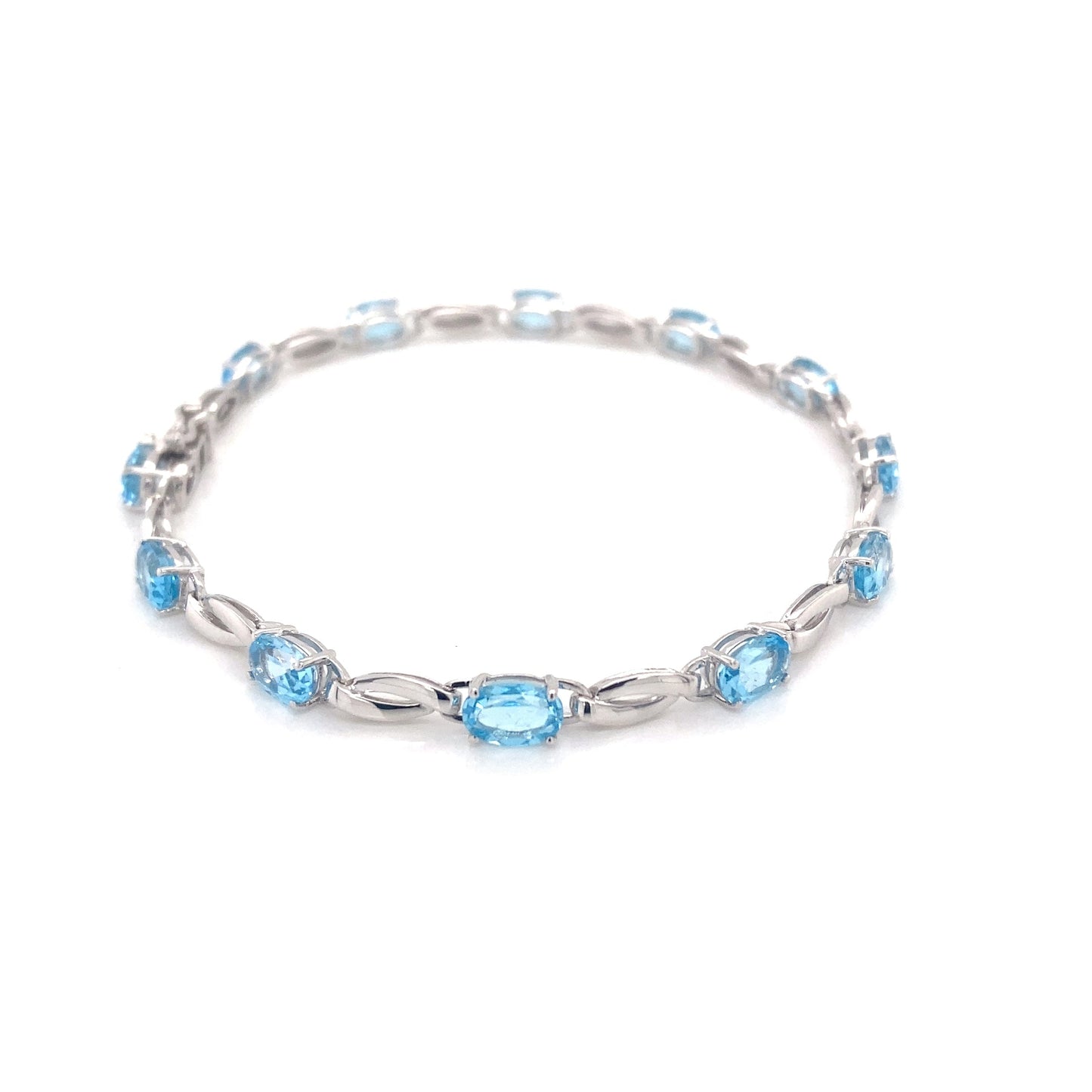 Swiss Blue Topaz and white gold bracelet Gardiner Brothers