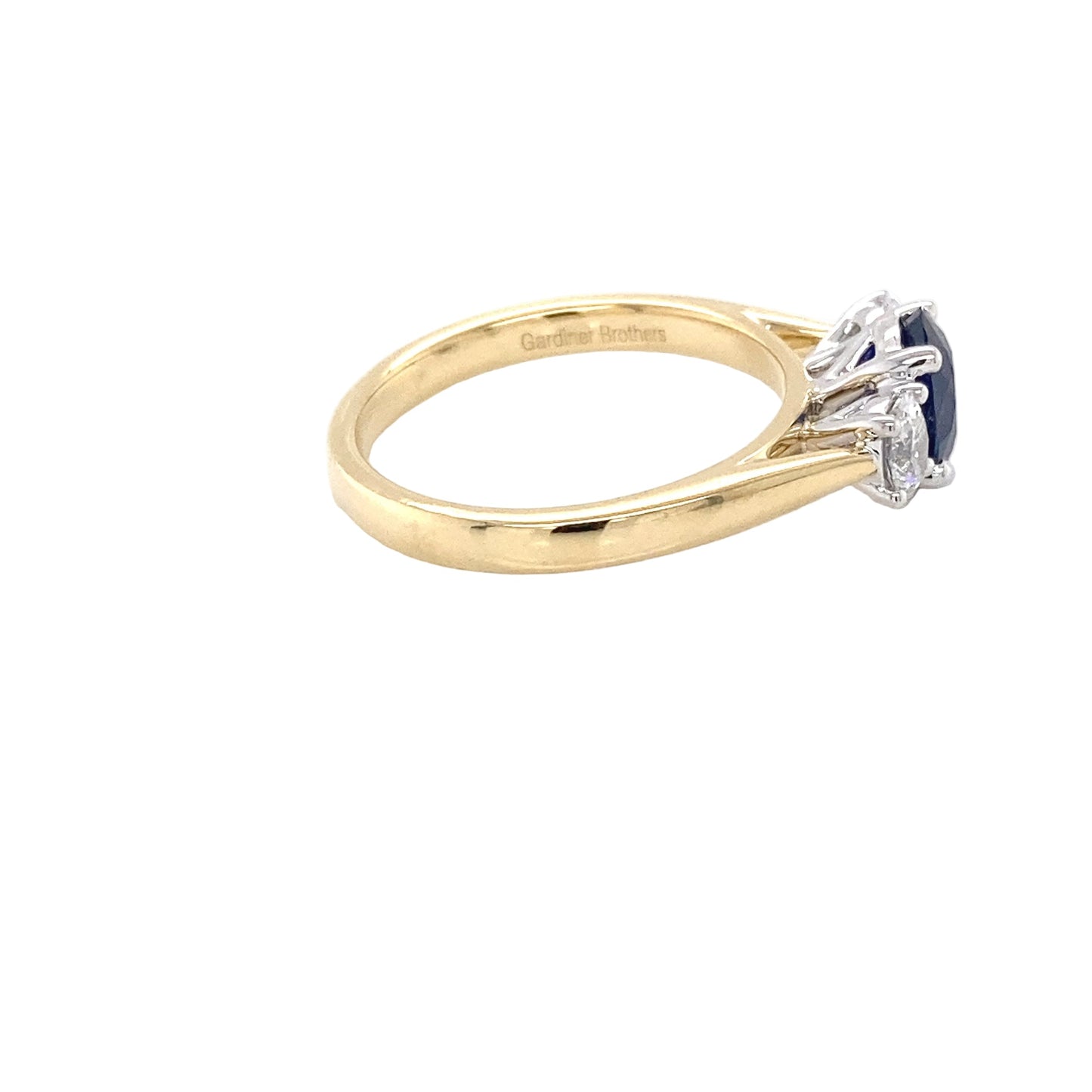 Oval Shaped Sapphire and Oval Diamond 3 stone ring Gardiner Brothers