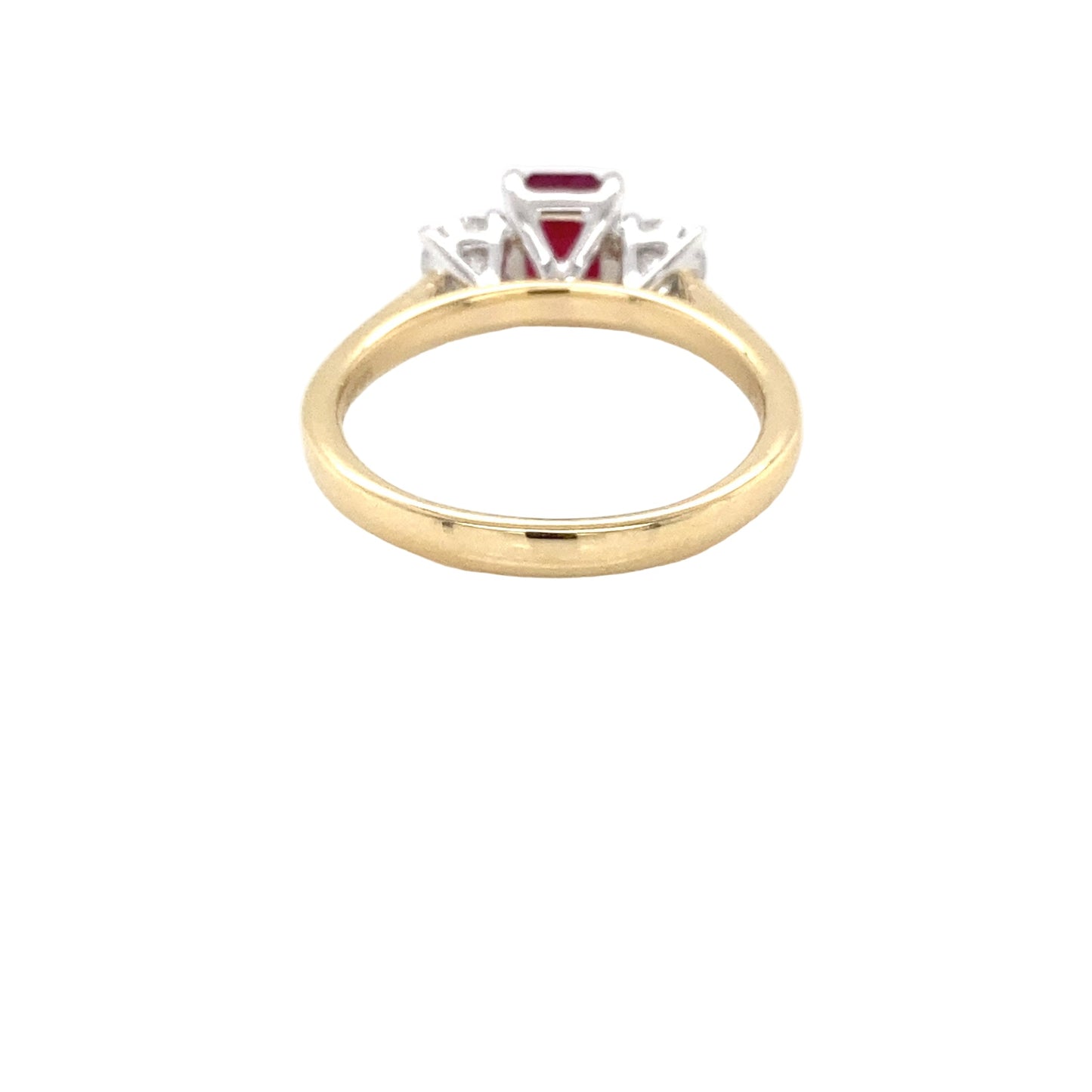 Octagonal Ruby and round brilliant cut diamond 3 stone ring Gardiner Brothers
