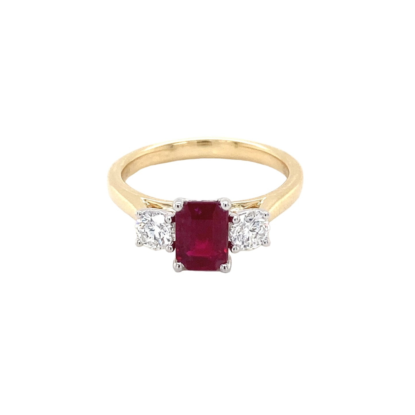 Octagonal Ruby and round brilliant cut diamond 3 stone ring Gardiner Brothers