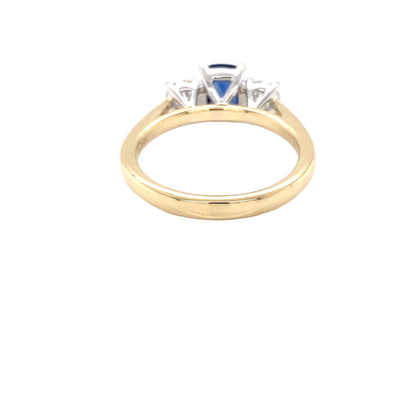 Cushion Shaped Sapphire and round brilliant cut diamond 3 stone ring Gardiner Brothers