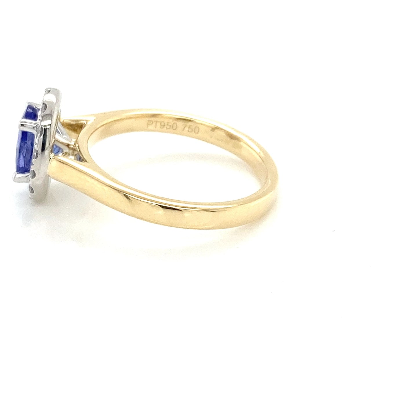 Oval Shaped Tanzanite and diamond halo ring Gardiner Brothers