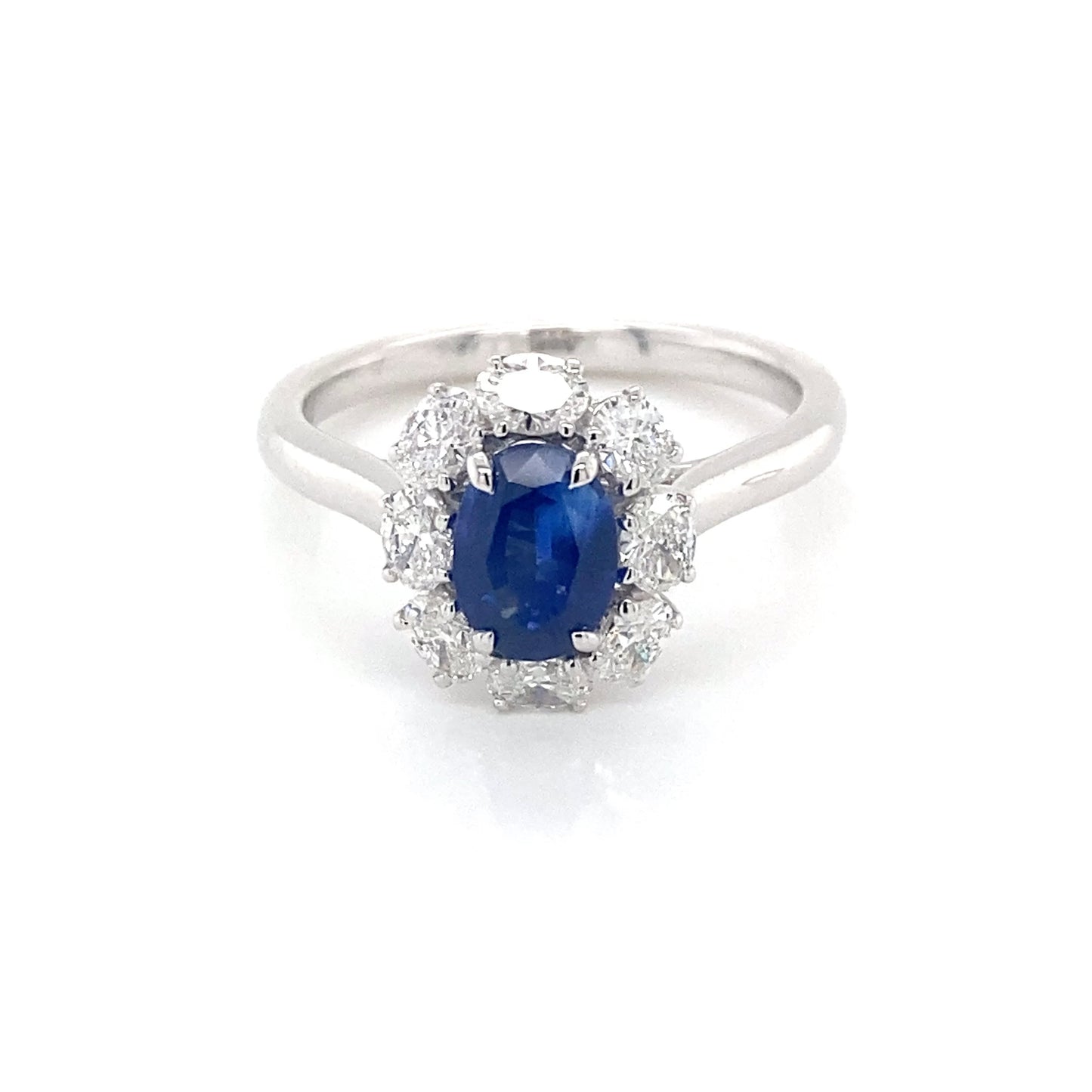 Oval Shaped Sapphire and Oval diamond cluster style ring Gardiner Brothers