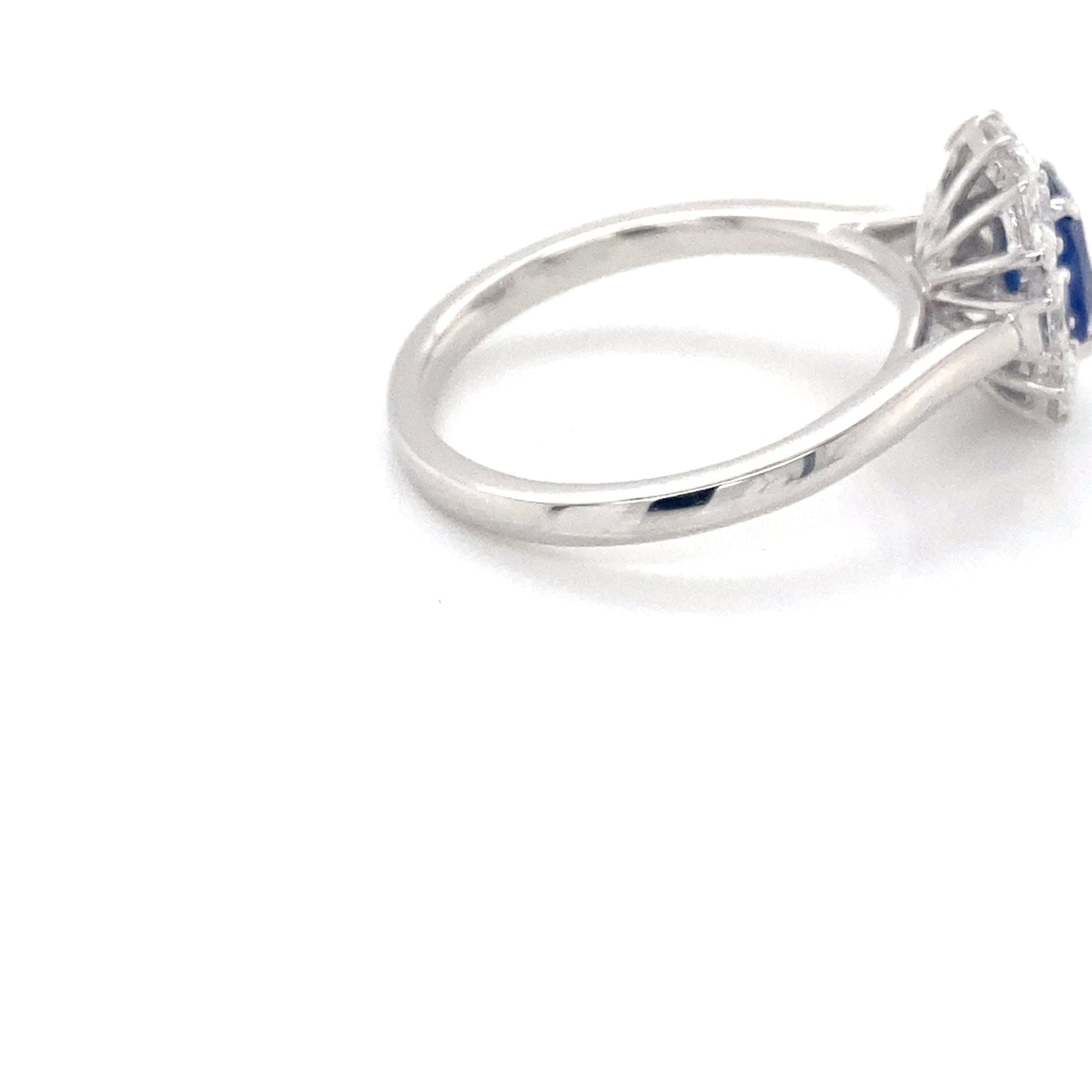 Oval Shaped Sapphire and Oval diamond cluster style ring Gardiner Brothers